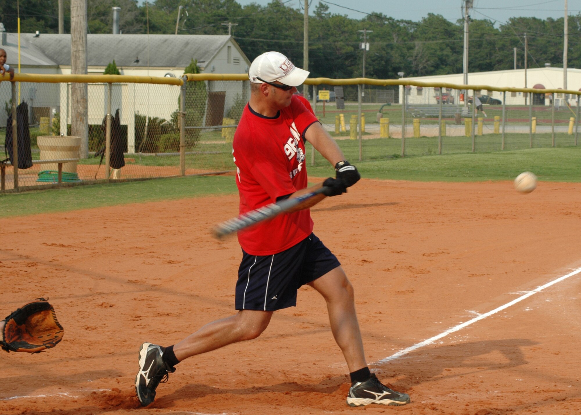 EGLIN AIR FORCE BASE, Fla. -- Tech. Sgt. Mark Lewald, 96th Medical Group, swings at a pitch during the softball intramural playoffs. The MedGroup beat the 96th Communication Squadron "Wire Dawgs" 7-6 and the 46th Aircraft Maintenance Squadron 10-5 July 9 to advance to the next round of the playoffs. They are scheduled to play against the 1st Special Operations Squadron July 13. (U.S. Air Force photo/ Airman Anthony Jennings)