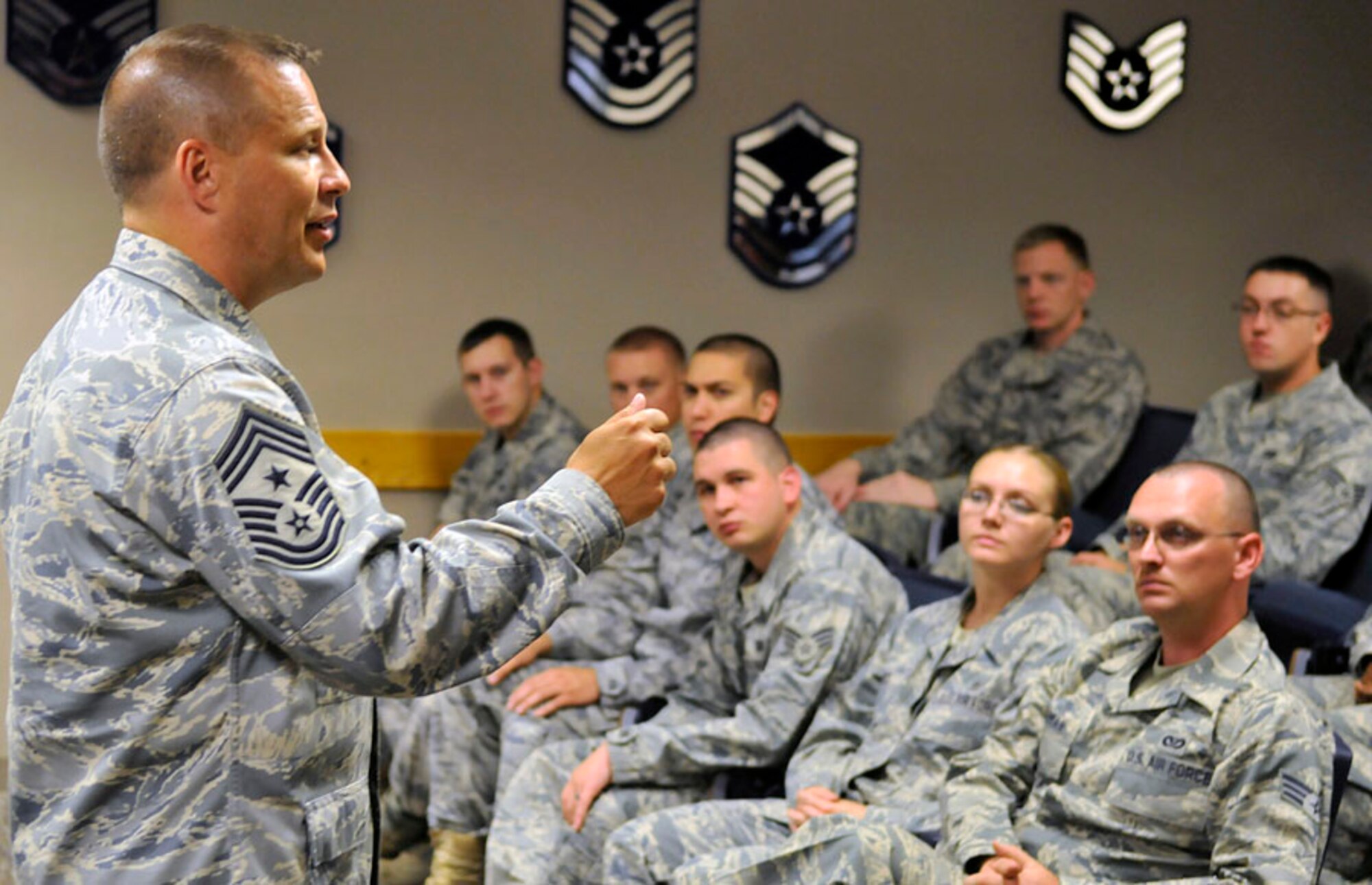 PETERSON AIR FORCE BASE, Colo. -- Chief Master Sgt. James MacKinley, 14th Air Force command chief, speaks to Airmen Leadership School students July 8. Chief MacKinley visited Colorado Springs July 6 through 10 and made familiarization stopovers at Peterson, Shriever AFB and Cheyenne Mountain. During his Peterson ALS visit, the chief discussed what it takes to be promoted to chief master sergeant. (Air Force photo by Larry Hulst) 


