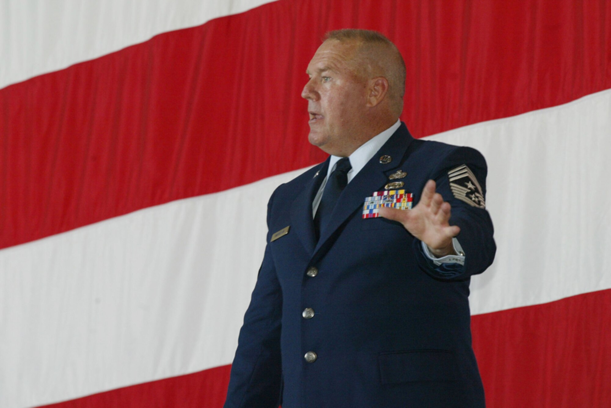 Command Chief Master Sgt. John M. Anderson of the 94th Airlift Wing addresses the enlisted Airmen during the commander’s call at Dobbins Air Reserve Base on July 11. (U.S. Air Force photo/Don Peek) 