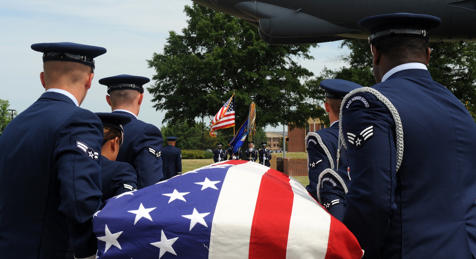 LANGLEY AIR FORCE BASE, Va. --  Members of the Langley Honor Guard carry a casket in a demonstration of a funeral ceremony during their graduation ceremony here July 9.  This was the first flight from Langley to be trained by the Air Force Honor Guard Training Team.  (U.S. photo/Senior Airman Zachary Wolf)

