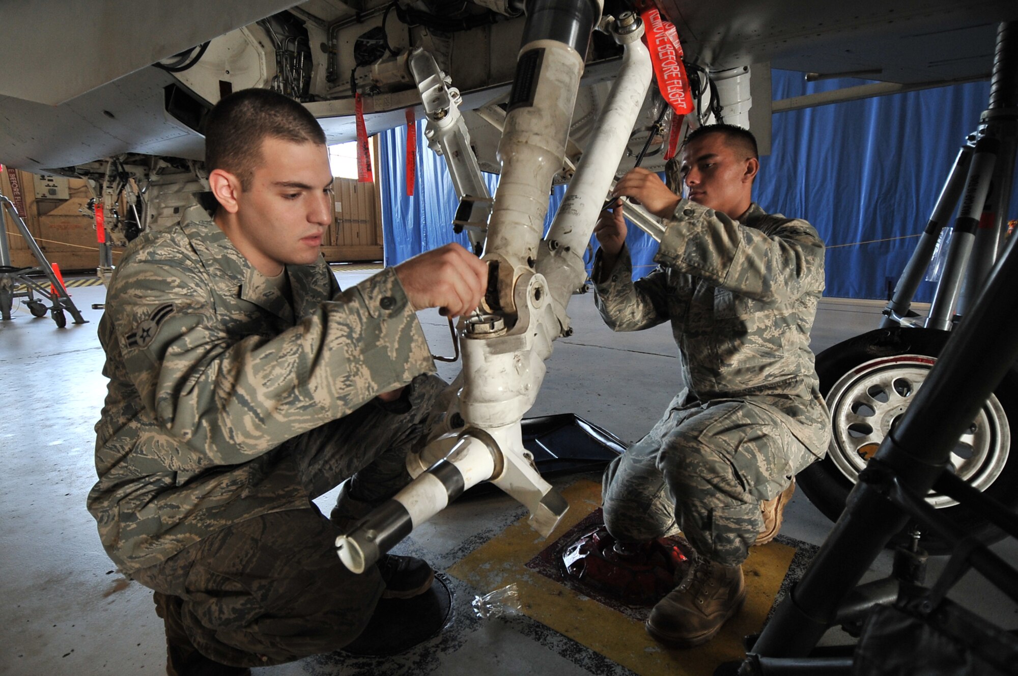 SHAW AFB, S.C. -- 20th Aircraft Maintenance Squadron members Airmen 1st Class Jeremy Keller, left, and Eric Rigsby, inspect the braking system of an F-16CJ aircraft, July 10. The 20th Maintenance Group is performing preventive maintenance inspections on all aircraft due to an unusual number of anti-skid problems. (U.S. Air Force photo/Senior Airman Kathrine McDowell)
