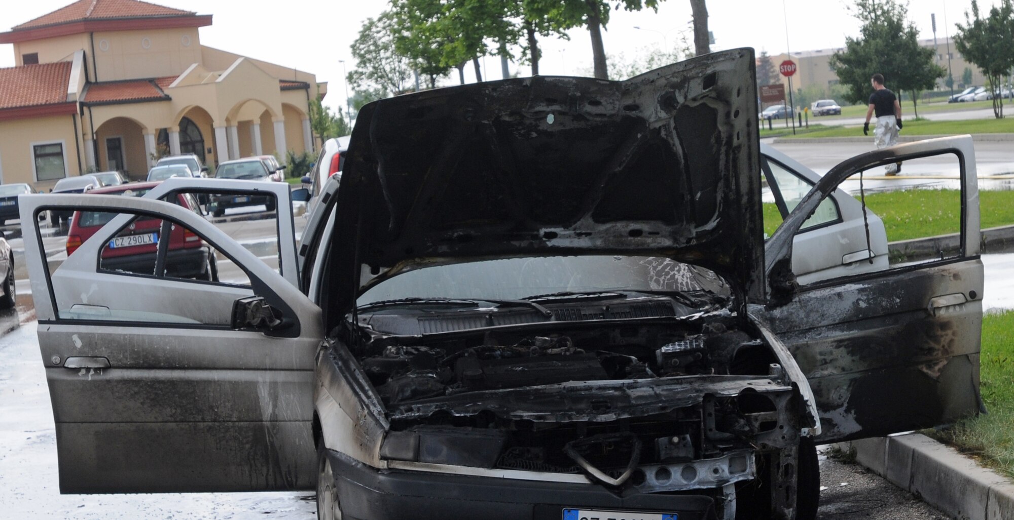 The 31st Civil Engineer Squadron fire department extinguised a car fire here July 4, 2009, in the AAFES Base Exchange parking lot.  Firefighters responded within 60 seconds of the call and had the fire out within minutes.  No one was injured in this incident.  (U.S. Air Force photo/Staff Sgt. Patrick Dixon)