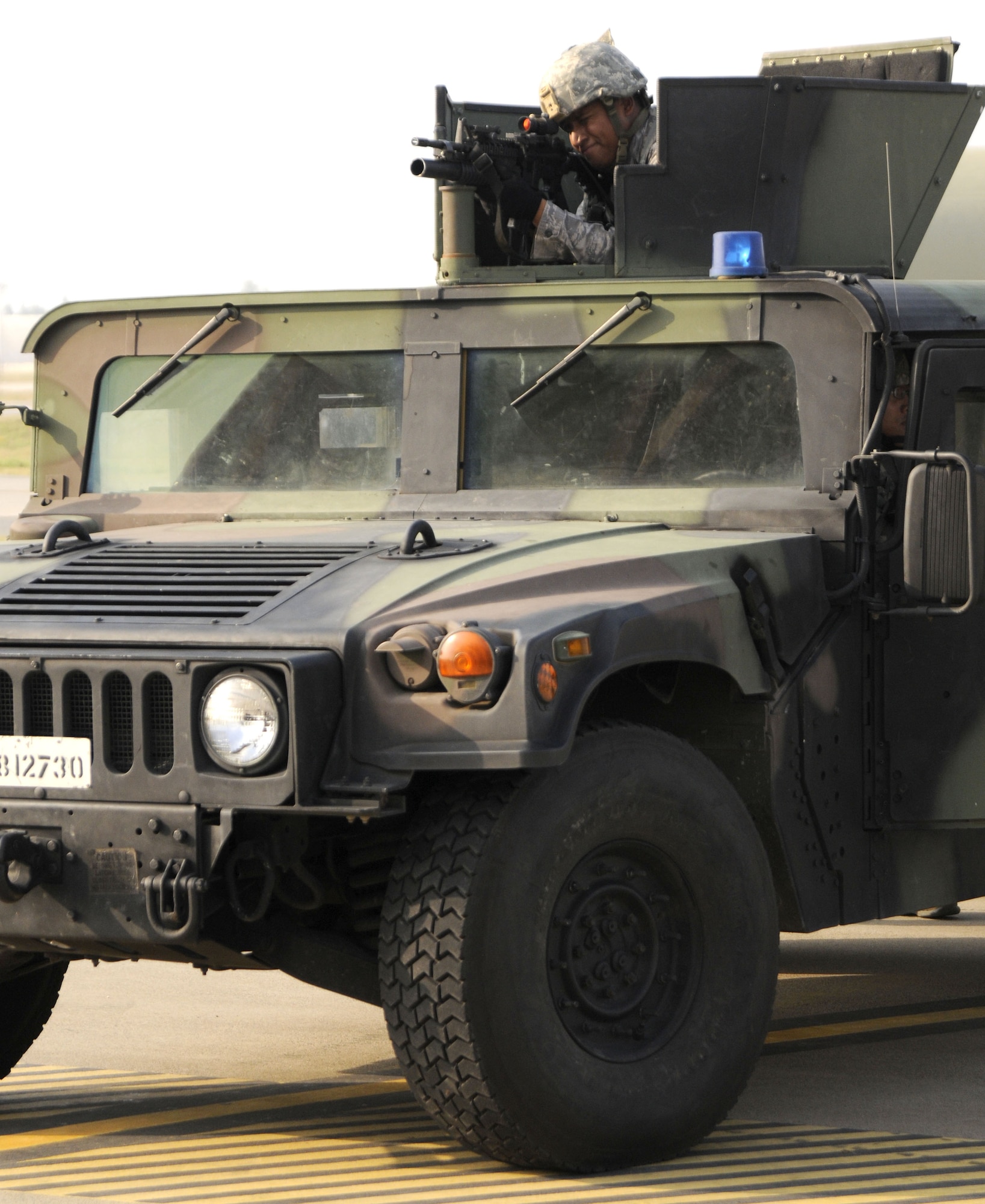 An Airman from 39th Security Forces Squadron stands ready, Wednesday, July 8, 2009, during an exercise at Incirlik Air Base, Turkey. An exercise evaluation team evaluated participating squadrons on their exercise responses. (U.S. Air Force photo/Airman 1st Class Amber Russell)