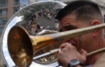 Staff Sgt. Kem Ebo, Quantico, Va., Marine Corps Band, Dixieland band leader, plays in Foley Square, New York City, July 13.  These Marines are part of one of the oldest ensembles in the Marine Corps. (Official Marine Corps photo by Sgt. Randall A. Clinton)