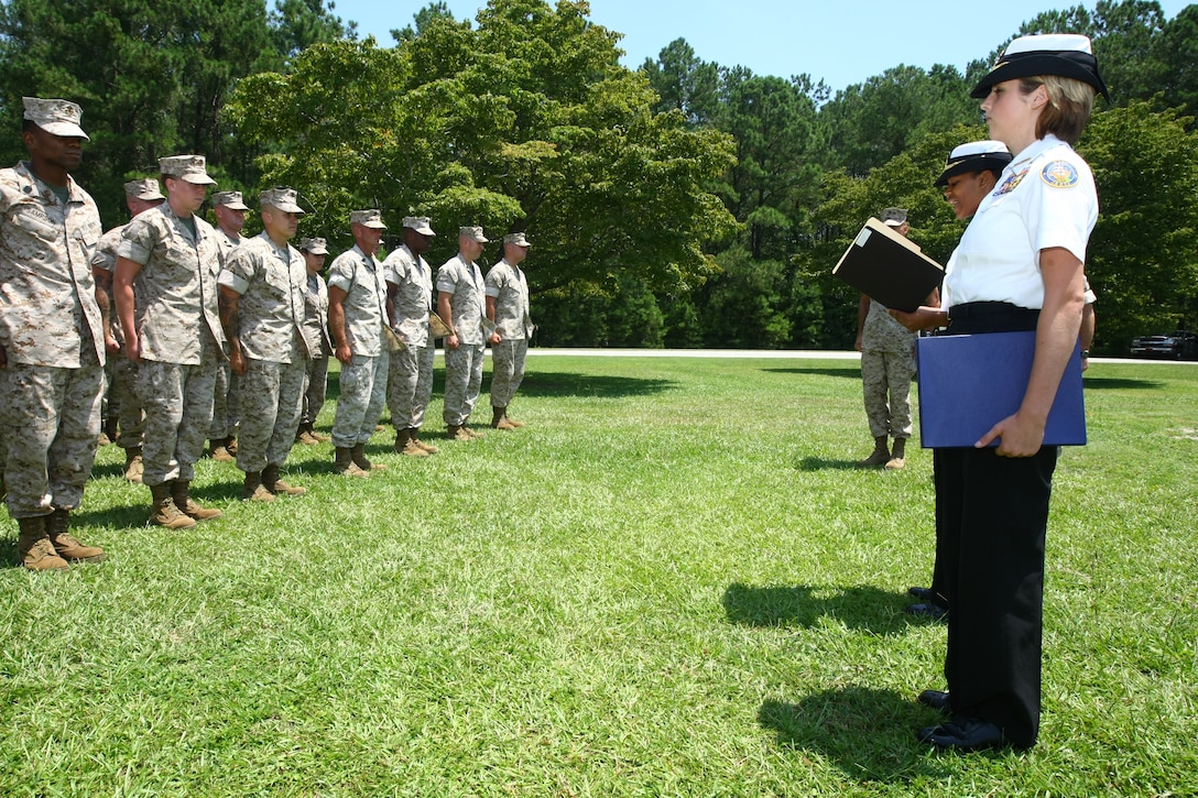 The Naval Junior Reserve Officers Training Corps with Cape Fear High School presented the Staff Non Commissioned Officers Academy with a letter of commendation signed by the high school’s principal as well as a plaque for their ‘exceptional loyalty and performance of duty over the years,’ July 14. For several years, Marines with the academy have been donating their time to help students with the Navy JROTC during their drill competitions. The Marines served as judges for these events. ::n::