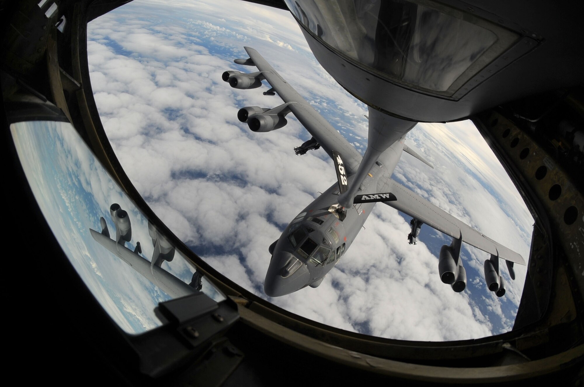 A KC-135 Stratotanker refuels a B-52 Stratofortress deployed from Barksdale Air Force Base, La., to Andersen AFB, Guam, to support U.S. Pacific Command’s Theater Security Package and Continuous Bomber Presence in the Asia-Pacific region, July 13. The B-52 was one of two airframes participating in exercise Talisman Saber 09, a U.S. Pacific Command-directed, bilateral command post and field-training exercise designed to maintain a high level of interoperability between U.S. and Australian forces. (U.S. Air Force photo/Senior Airman Christopher Bush)