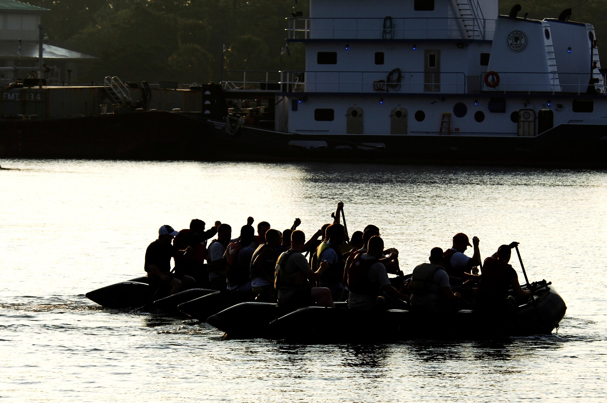 HURLBURT FIELD, Fla. -- Teams maneuver around water obstacles in an effort to rescue their fallen wingmen during the Commando Challenge Zodiac Regatta July 10. (U.S. Air Force photo/Senior Airman Sheila DeVera)(RELEASED)