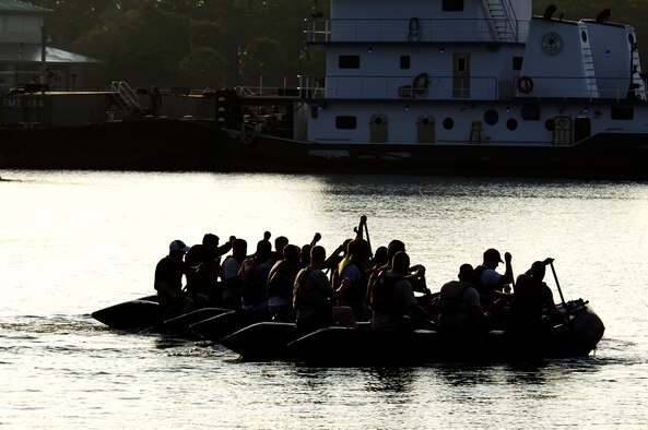 HURLBURT FIELD, Fla. -- Teams maneuver around water obstacles in an effort to rescue their fallen wingmen during the Commando Challenge Zodiac Regatta July 10. (U.S. Air Force photo/Senior Airman Sheila DeVera)(RELEASED)