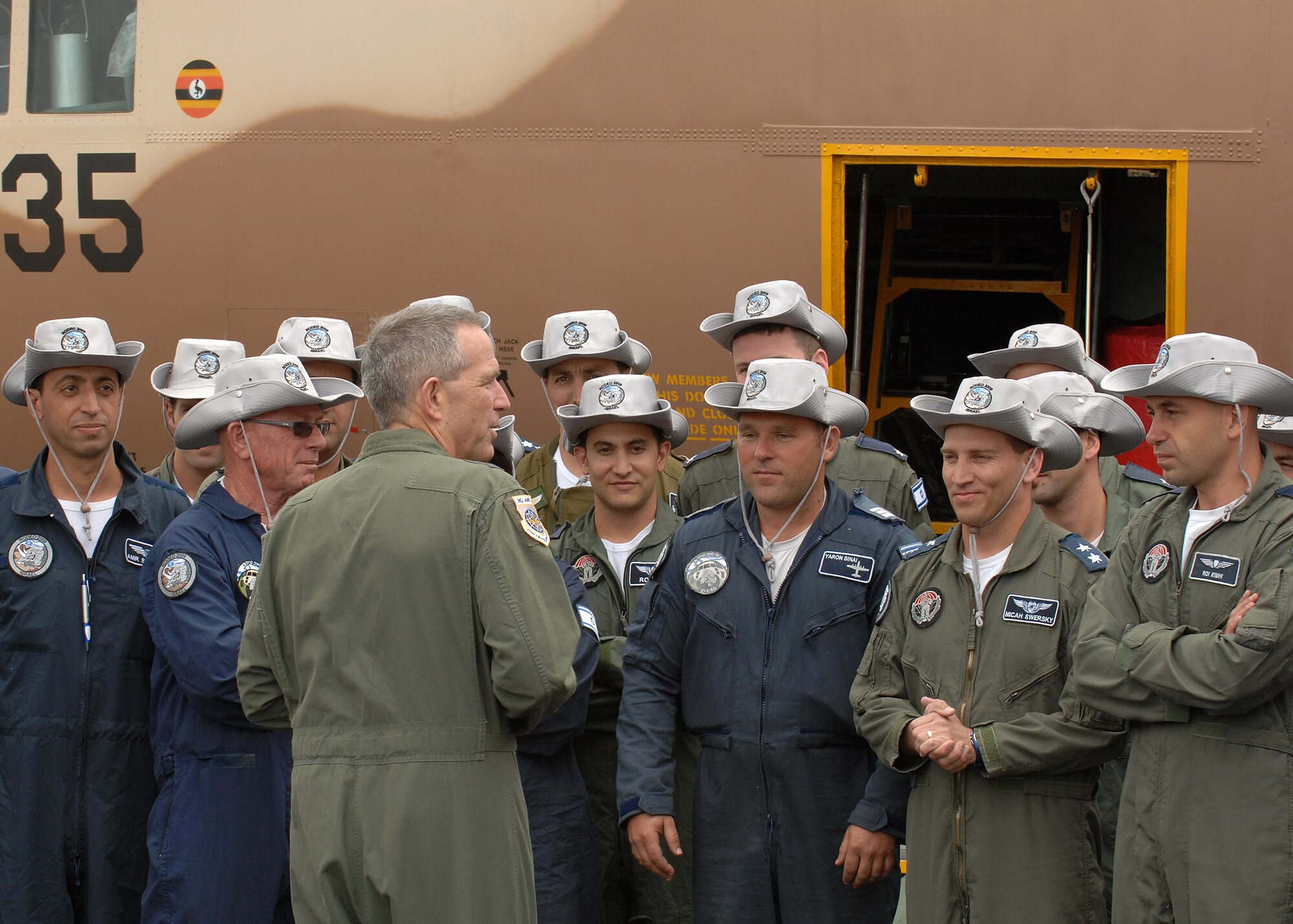 U.S. Air Force Maj. Gen. Brooks Bash, director of Air, Space and Information Operations, Headquarters Air Mobility Command, Scott Air Force Base,, Ill., greets members of the Israeli air force at McChord July 13. The airmen are here to participate in Air Mobility Command's Rodeo 2009, an international competition that focuses on improving worldwide air mobility forces' professional core abilities. (U.S. Air Force photo/Staff Sgt. Stephen Schester)  