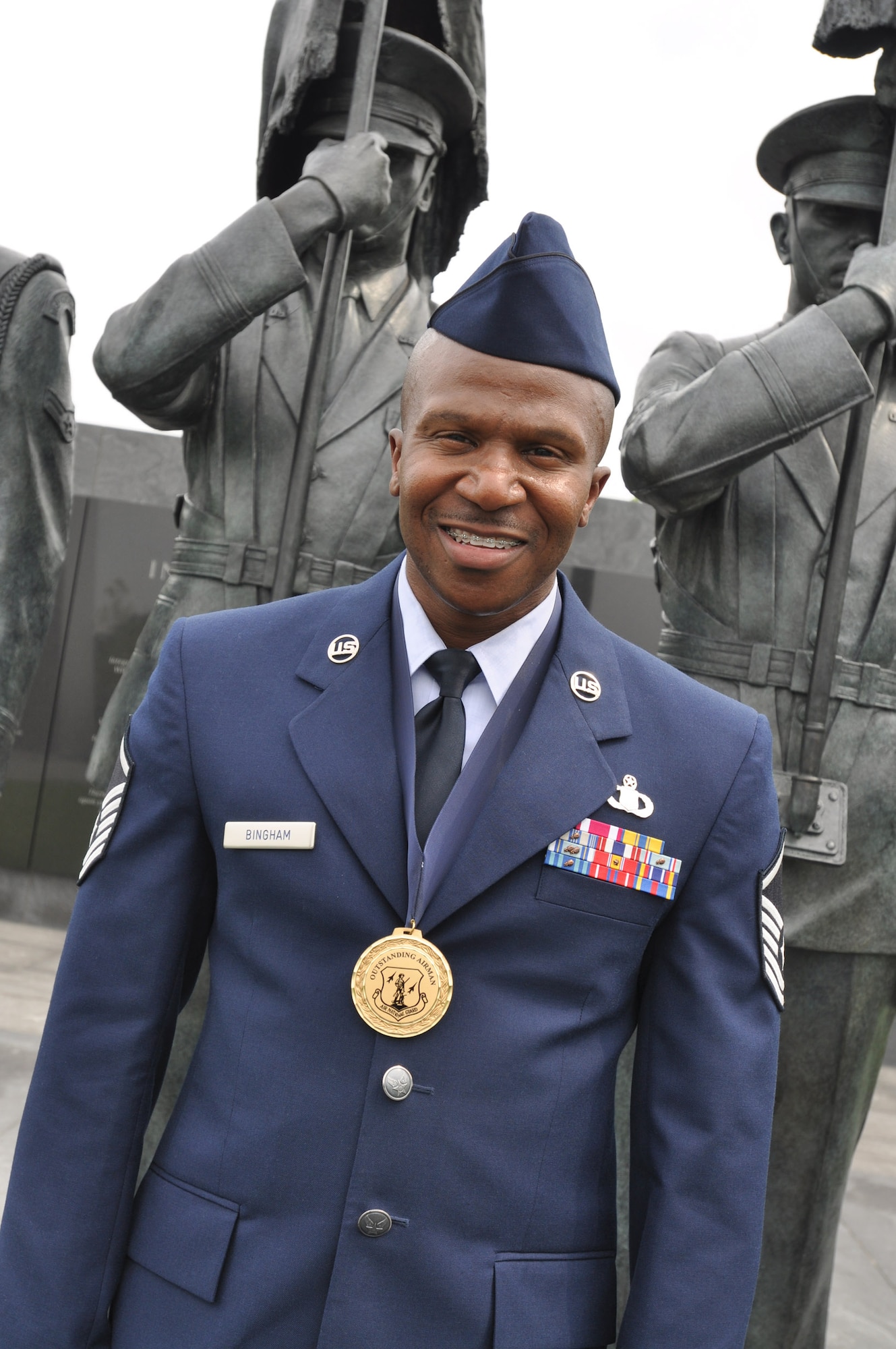 Air Force Master Sgt. Tyrone Bingham, one of the Air Force's 12 Outstanding Airmen of the Year for 2009 and the Air National Guard's 2009 Senior Noncommissioned Officer of the Year, visits the Air Force Memorial outside Washington June 9. (U.S. Air Force photo by Air Force Master Sgt. Mike R. Smith, National Guard Bureau) (Released)