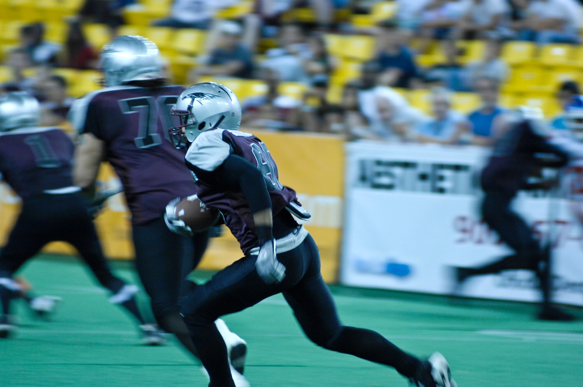 ANCHORAGE, Alaska -- Alaska Wild football player Lavone Nelson returns a kickoff during the first half of the Alaska Wild's season finale game against the Fairbanks Grizzlies July 9. Three active-duty Airmen from Elmendorf Air Force Base, Alaska, play on the Alaska Wild team. (U.S. Air Force photo/Senior Airman David Carbajal)