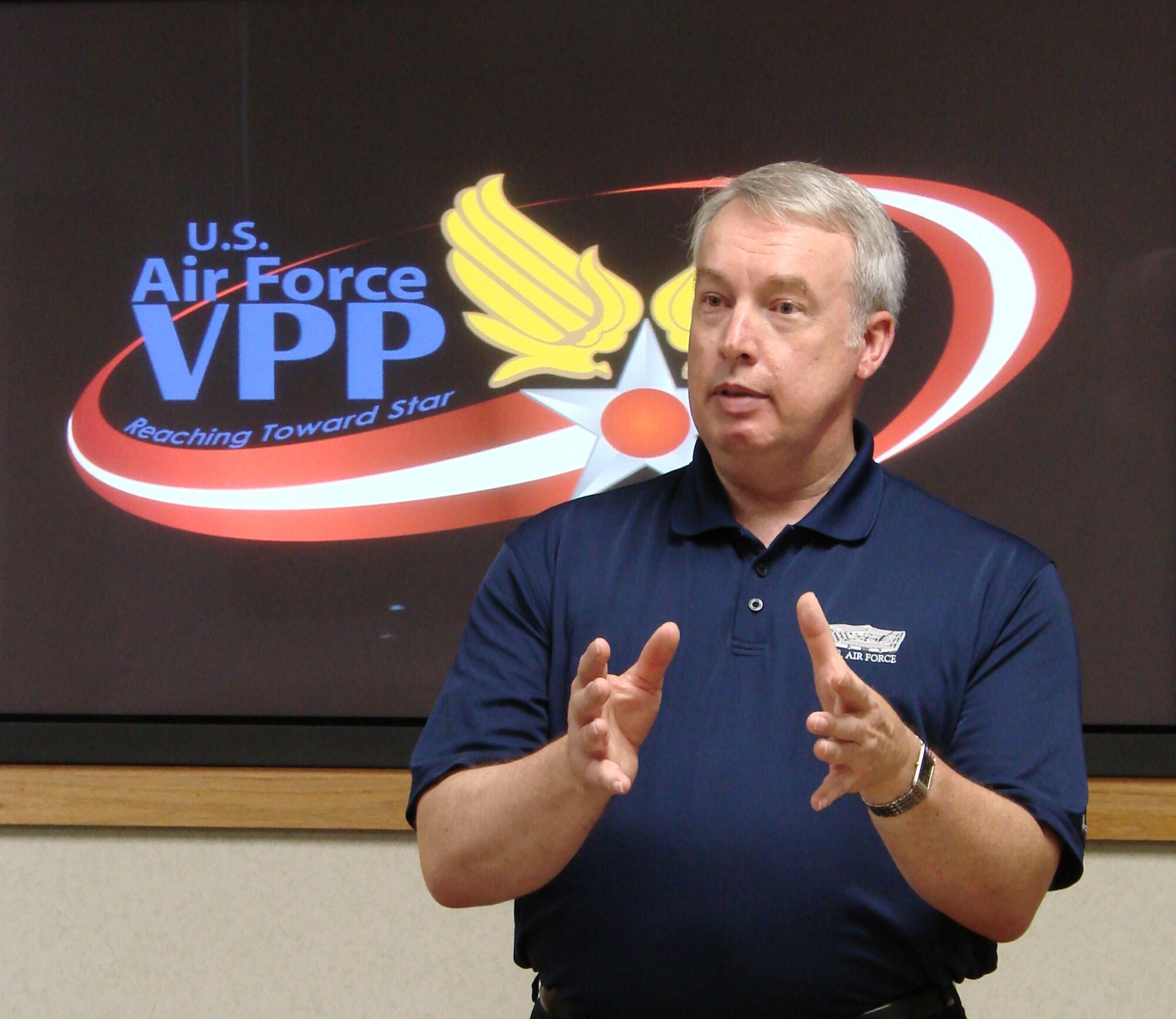 Vance Lineberger, Deputy for Safety from the office of the Deputy Assistant Secretary (Energy, Environment, Safety & Occupational Health), briefs the wing commander and group commanders about the Voluntary Protection Program at Vance AFB. The VPP is meant to blend with existing safety programs to improve the overall safety culture of the base. (U.S. Air Force Photo by 2nd Lt. Katherine Roling)