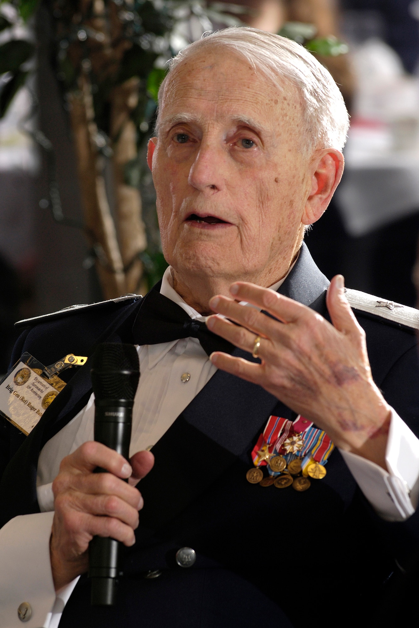Retired Brig. Gen. Roger Bate addresses attendees at the Astronautics Department's 50th anniversary celebration March 7, 2008. General Bate died March 18 in McKinney, Texas. (U.S. Air Force photo/Mike Kaplan)