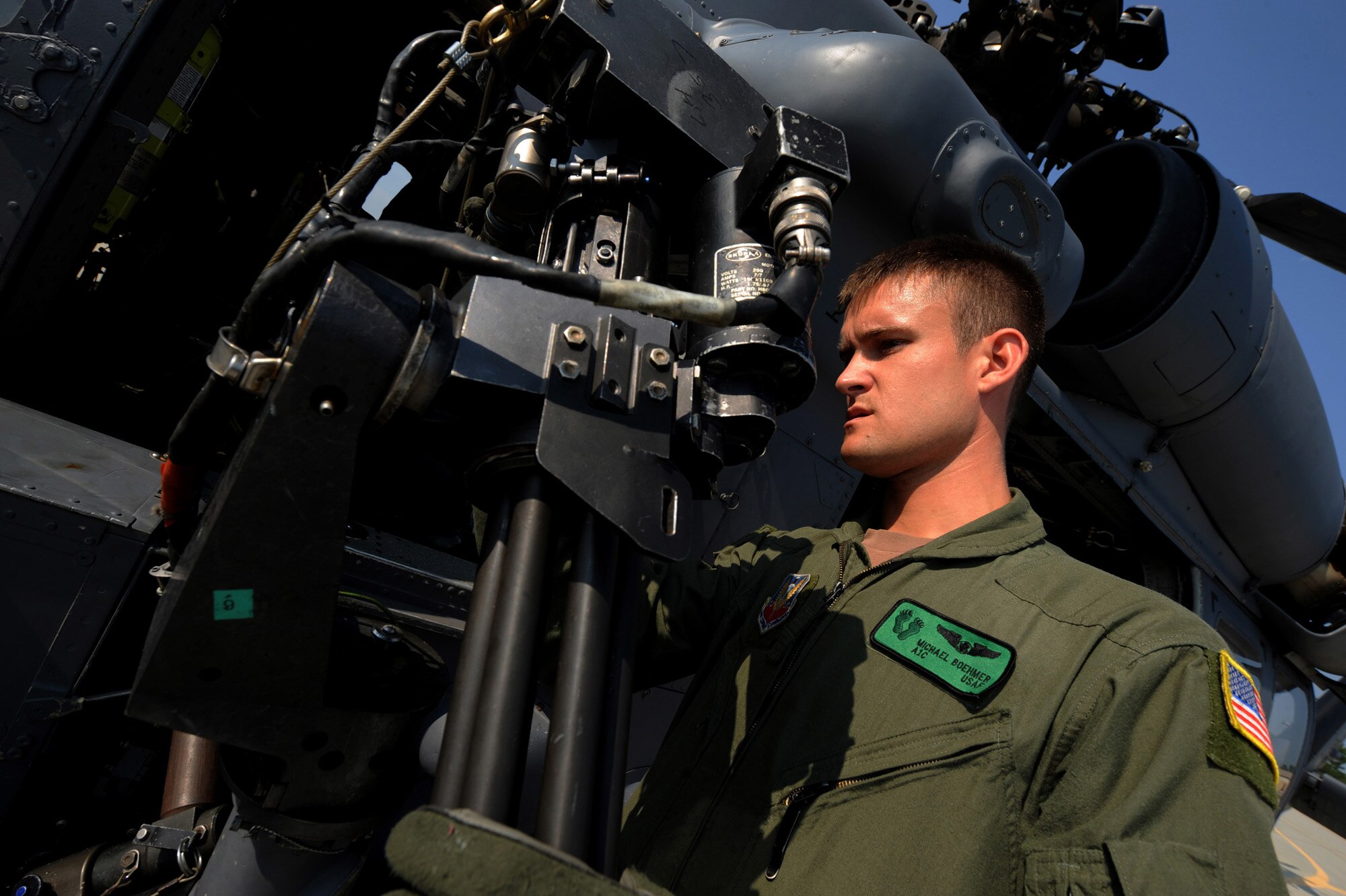 MOODY AIR FORCE BASE, Ga. -- Airman 1st Class Michael Boehmer, 41st Rescue Squadron aerial gunner, performs a preflight inspection on an HH-60G Pave Hawk. Preflight checks are done to ensure everything on the aircraft is up to mission standards. (U.S. Air Force photo by Senior Airman Gina Chiaverotti)