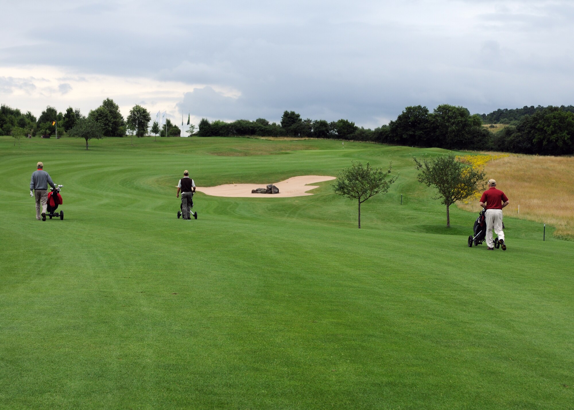 SPANGDAHLEM AIR BASE, Germany -- Members of the 52nd Fighter Wing enjoy a day at the Bitburger Land Golf Resort in Hermesdorf July 11. The tournament organizers also offered participants a chance to take a wagon ride, indulge in a barbecue lunch and receive golfing tips. (U.S. Air Force photo by Airman 1st Class Nathanael Callon)