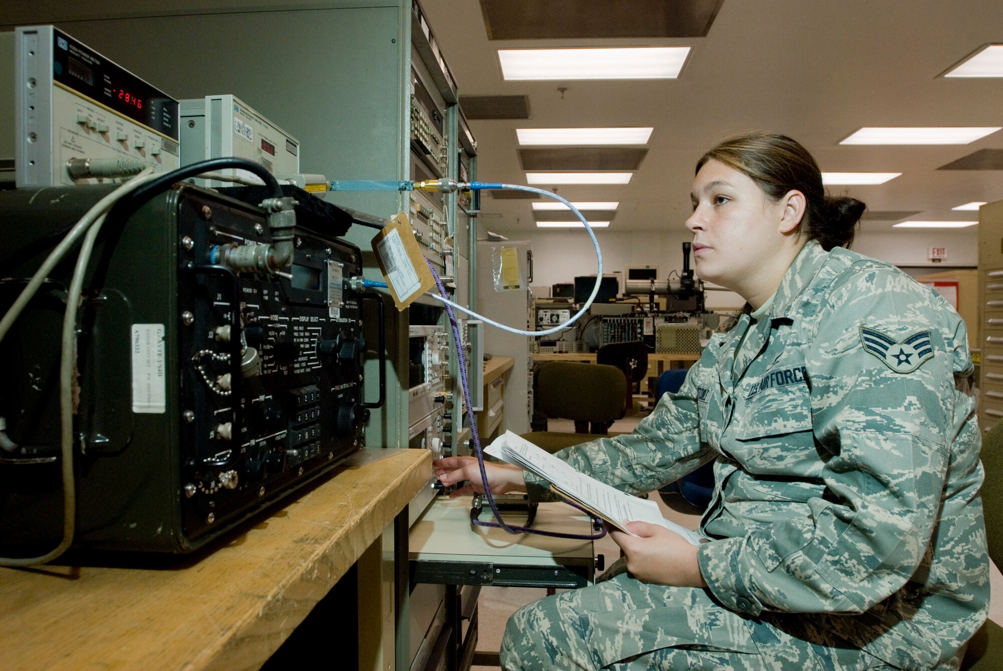Senior Airman Monique Deletoile, 8th Maintenance Squadron, calibrates a radar test set at Kunsan Air Base. Republic of Korea July 14. Airman Deletoile is a precision measurement equipment laboratory journeyman for the test measurement and diagnostic equipment flight. The TMDE flight is responsible for keeping equipment intolerance and on target. (U.S. Air Force photo by Senior Airman Jonathan Steffen)