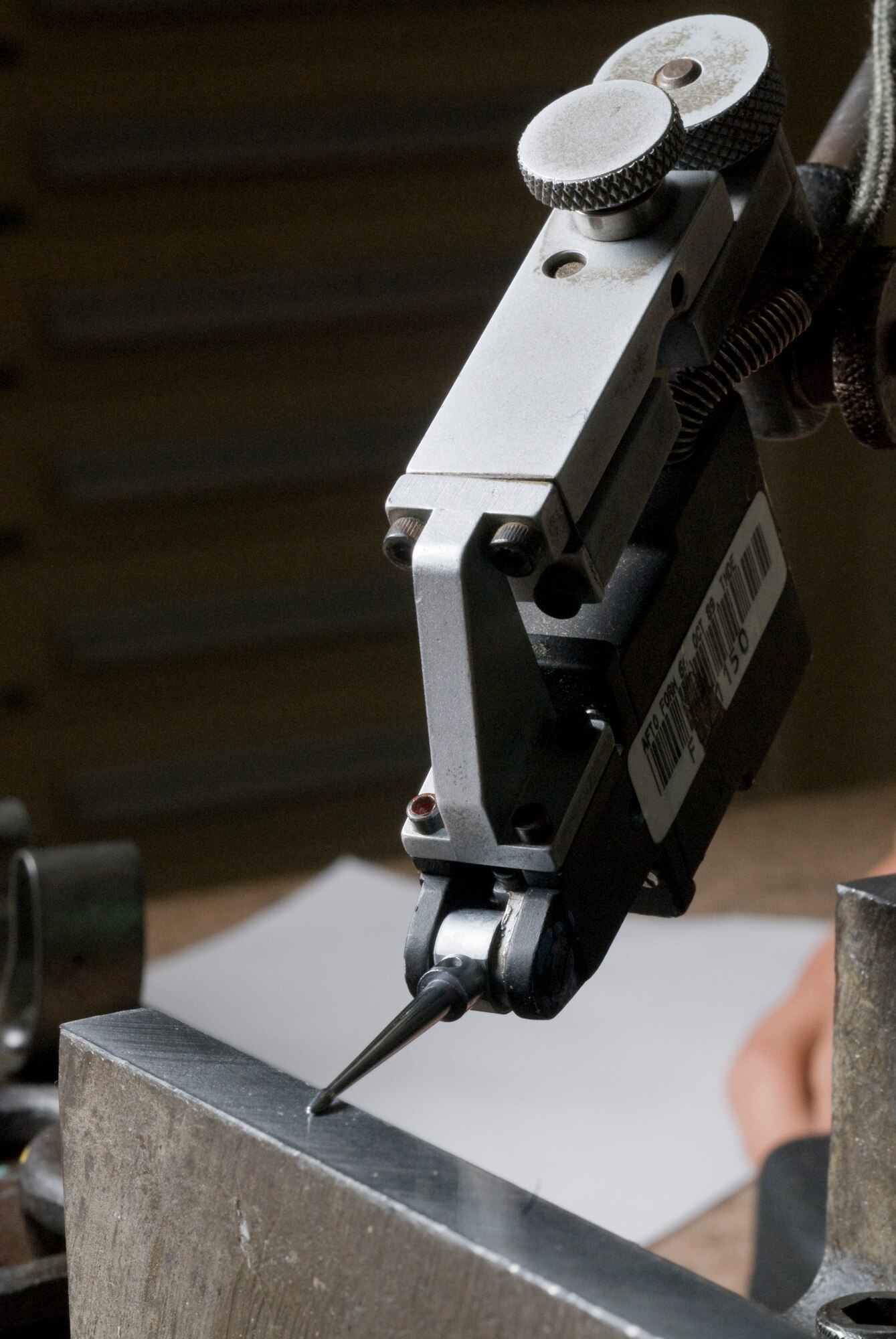 An electronic height gauge calibrates a drag brace fixture at Kunsan Air Base. Republic of Korea July 14. An electronic height gauge is one tool used by a precision measurement equipment laboratory craftsman that works for the test measurement and diagnostic equipment flight. The TMDE flight is responsible for keeping equipment intolerance and on target. (U.S. Air Force photo by Senior Airman Jonathan Steffen)