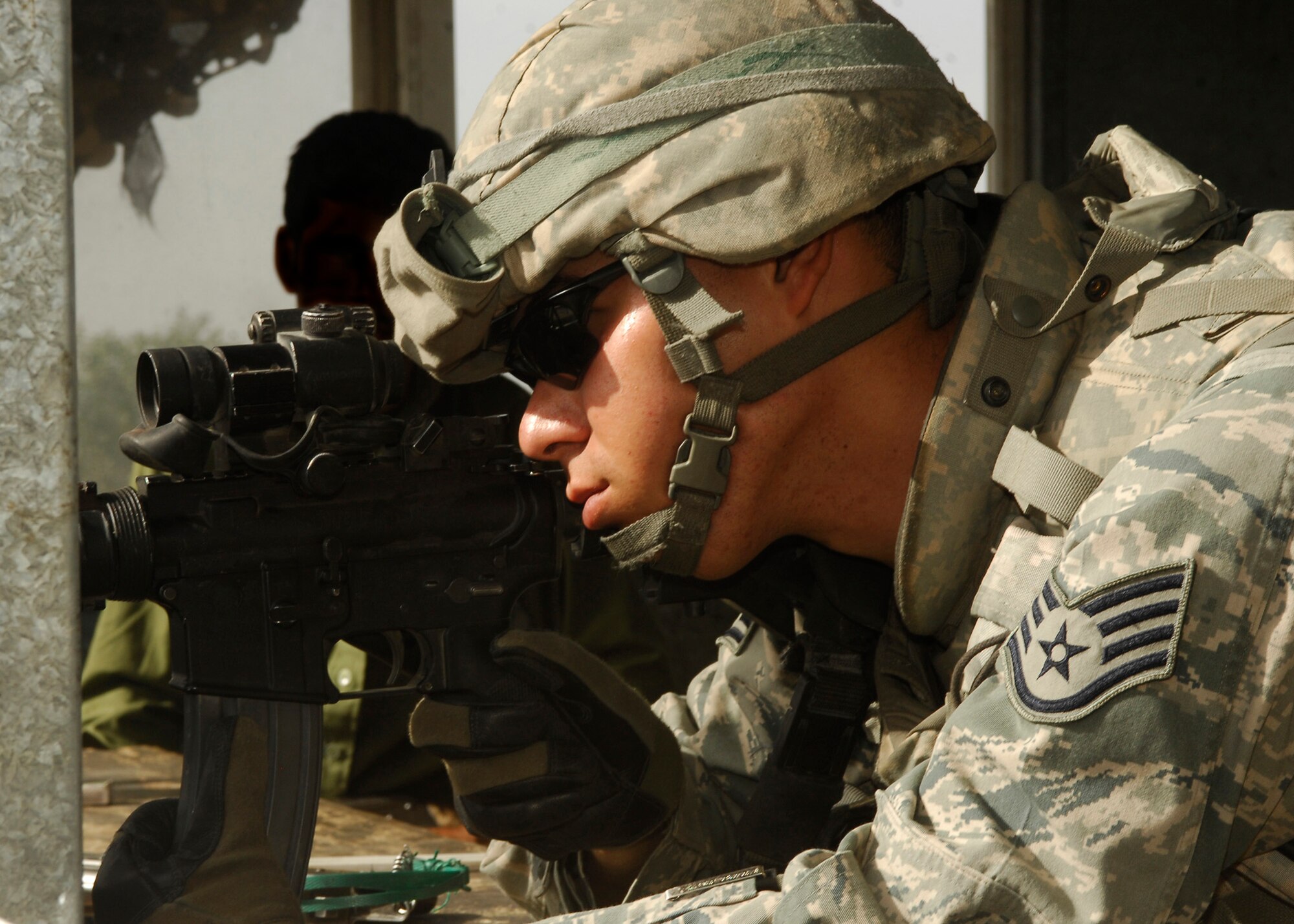 Staff Sergeant Steven Lugo-Velez from the 455th Expeditionary Security Forces Squadron protects the perimeter of Bagram Air Field, Afghanistan. Sergeant Lugo-Velez is originally from Bronx, N.Y. and is deployed from Edwards Air Force Base, Calif.  (U.S. Air Force photo/Senior Airman Susan Tracy)
