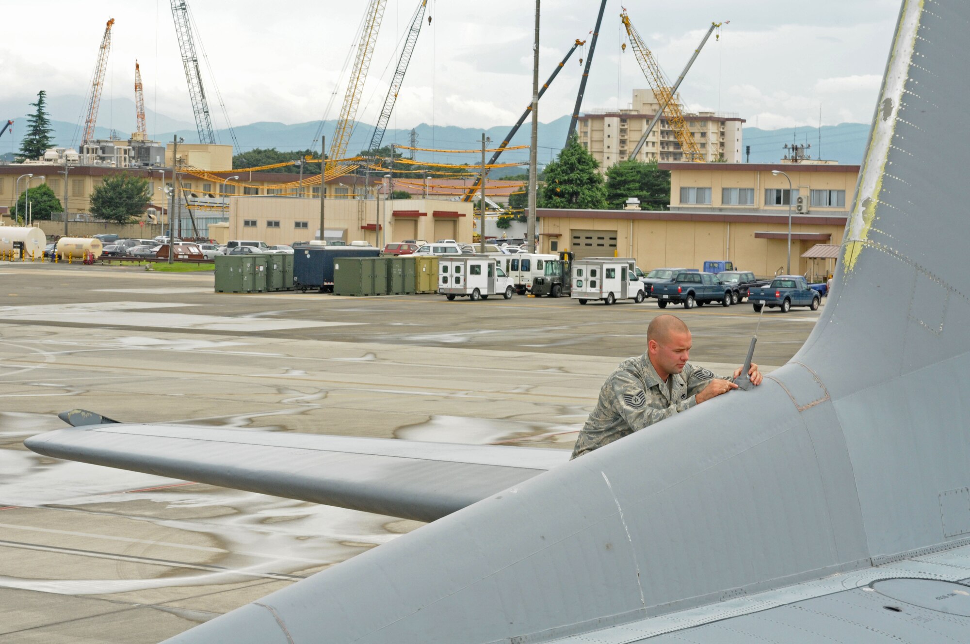 YOKOTA AIR BASE, Japan -- Tech. Sgt. Christopher Vaughn, 374th Aircraft Maintenance Squadron instrument flight control systems lead technician, visually inspects an emergency locator transmitter. The 374th AMXS has been preparing a C-130 for the 2009 Air Mobility Command Rodeo, which begins July 19 at McChord Air Force Base, Wash. Sergeant Vaughn is part of a maintenance team from Yokota that will compete. (U.S. Air Force photo/Staff Sgt. Veronica Pierce)