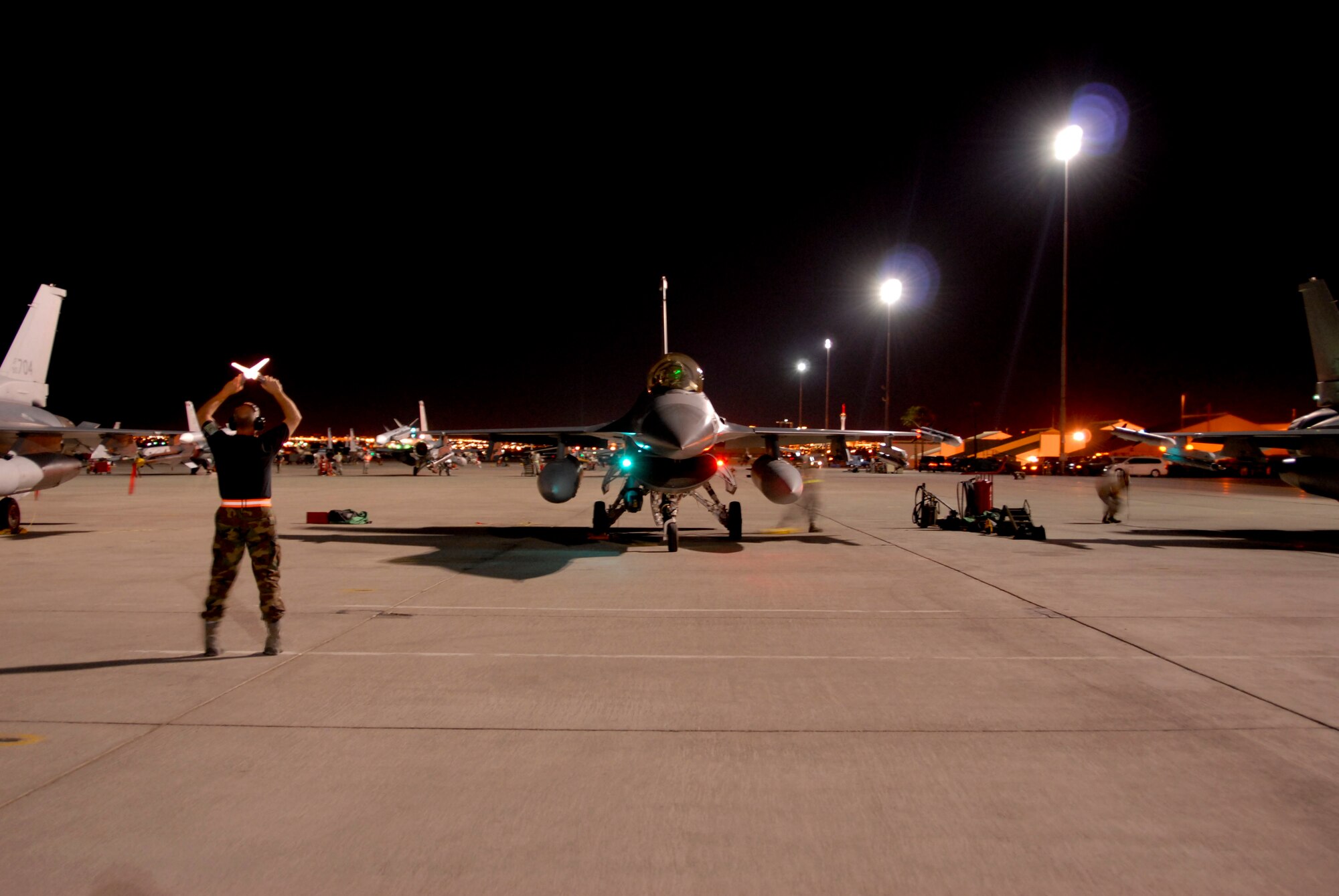 U.S. Air Force Airmen with the 180th Fighter Wing, Ohio Air National Guard are deployed to Nellis Air Force Base, Nev., July 12, 2009, to participate in a Red Flag exercise. Red Flag exercises are designed to provide the most realistic training environments for United States and allied air forces. (U.S. Air Force photo by Tech. Sgt. Beth Holliker/Released)
