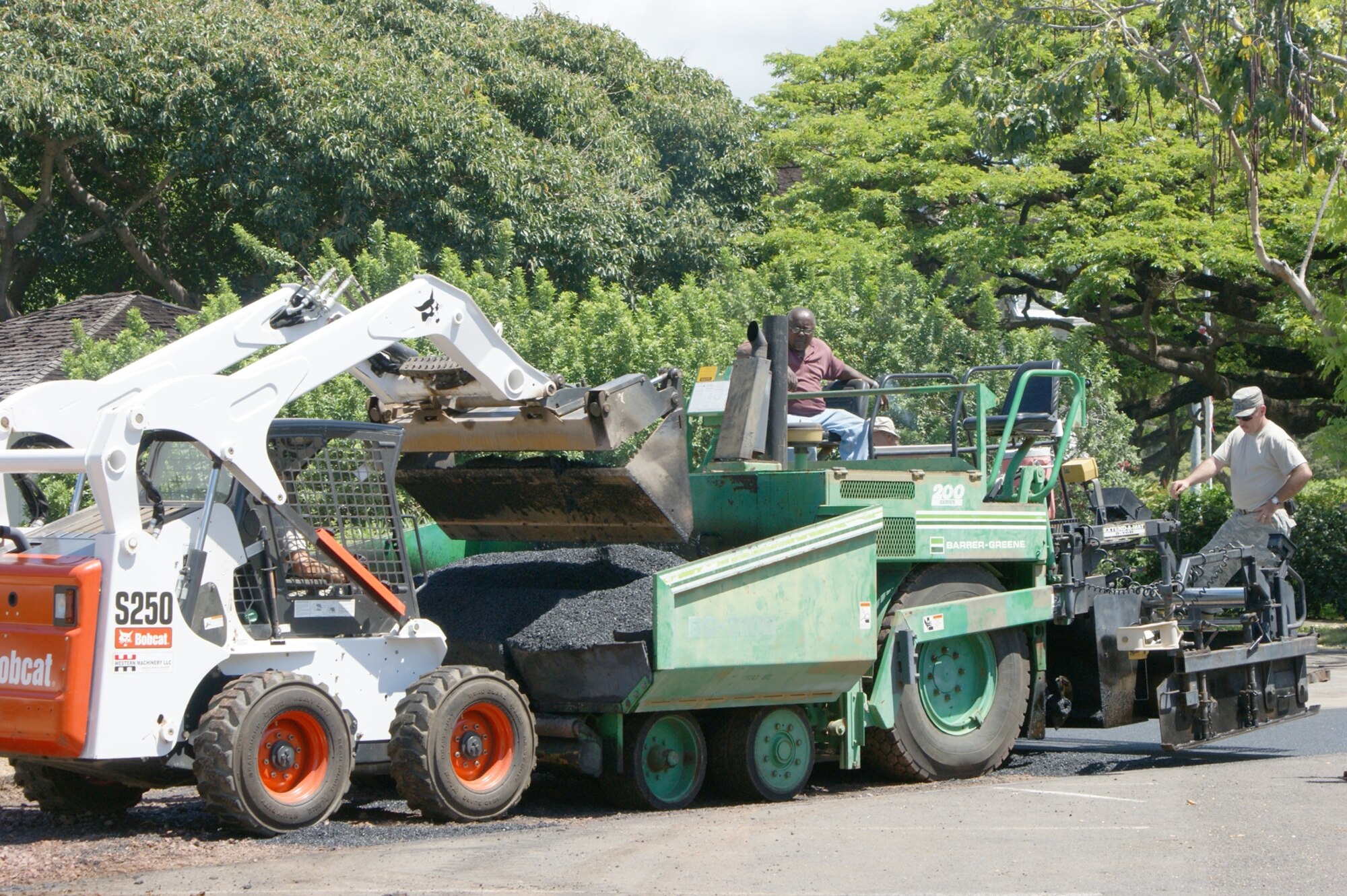 The 15th Civil Engineer Squadron at Hickam Air Force Base teamed up with Naval Facilities Engineering Command Hawai’i, Fleet Industrial Supply Center, Pearl Harbor, and the contractor SAIC to finish a road project on Lehua Way at Naval Station Pearl Harbor. (U.S. Navy photo/James Johnson)
