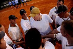 Members of the 1st Combat Camera Squadron celebrate the win against the 437th Force Support Squadron July 14. Combat Camera played a double header on Tuesday and won both games. (U.S. Air Force photo/Senior Airman Nicholas Pilch)