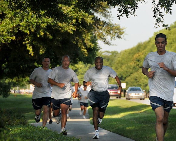 Airmen keep their eyes on the prize as they approach the final stretch during the Commander's 5K Run/Walk Challenge here July 10. Airmen from across Charleston AFB participated in the morning fitness challenge, testing their speed along the 5K course. The next challenge is scheduled for Aug. 7 and planned to be hosted by the 437th Mission Support Group. (U.S. Air Force photo/Staff Sgt. Daniel Bowles)