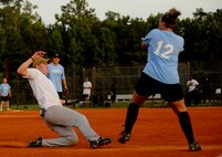 Clay Lancaster of the 1st Combat Camera Squadron slides into third base during a game against the 437th Force Support Squadron July 14. Lancaster is a combat photographer in the 1 CTCS. (U.S. Air Force photo/ Senior Airman Nicholas Pilch)