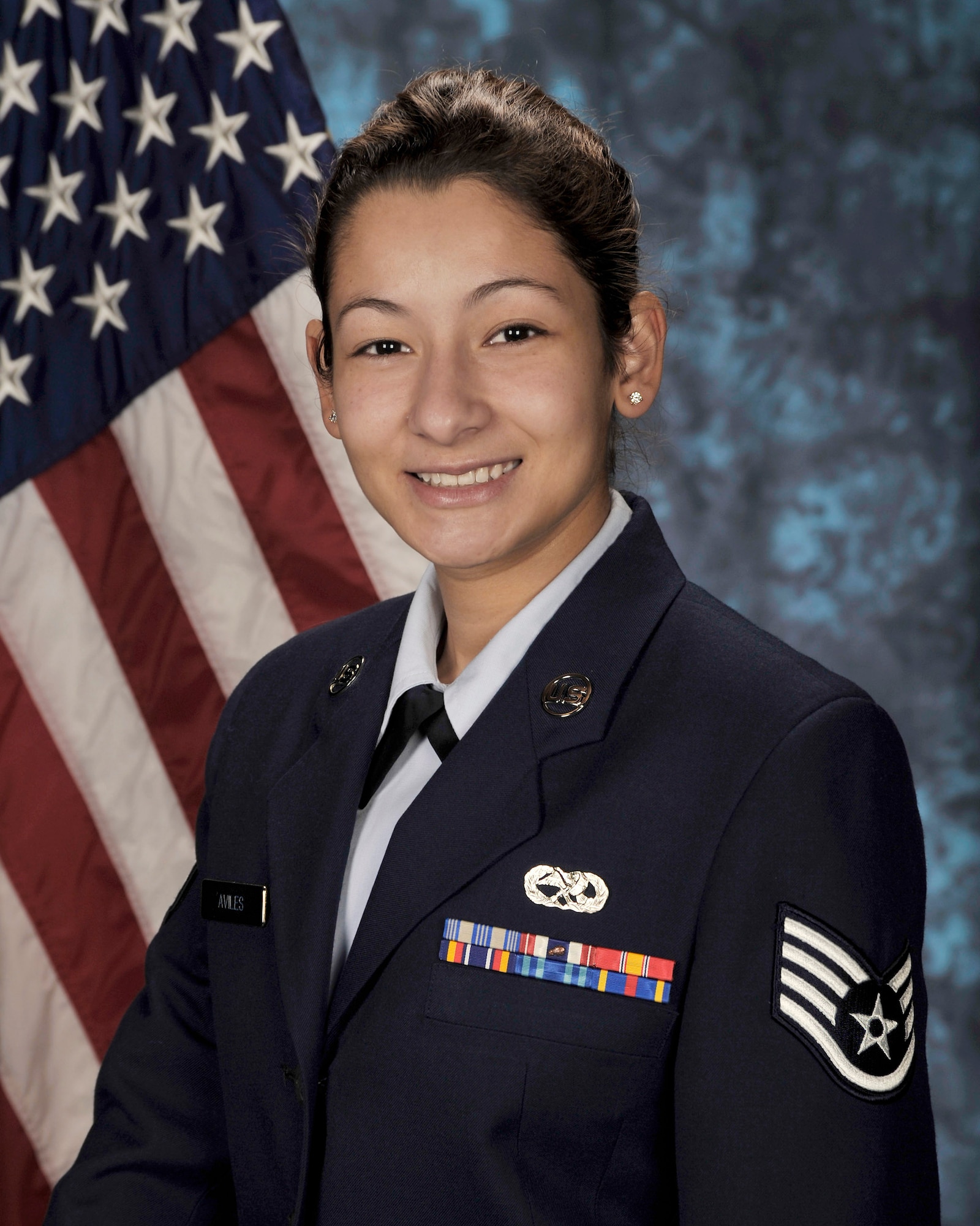 Staff Sgt. Johanna Aviles, a network operations technician assigned to the West Coast Communications Support Element at Los Angeles Air Force Base, Calif., monitored homeland unmanned aircraft system missions during the California wildfires where more than 72 fires were identified and contained. The 12 Outstanding Airmen of the Year are selected based on superior leadership, job performance, significant self-improvement/ personal achievements and base/community involvement. The Air Force Chief of Staff reviews the selections. The selections for the 2009 12 Outstanding Airmen of the Year were announced July 2 by Air Force officials at Randolph Air Force Base, Texas. (U.S. Air Force photo)
