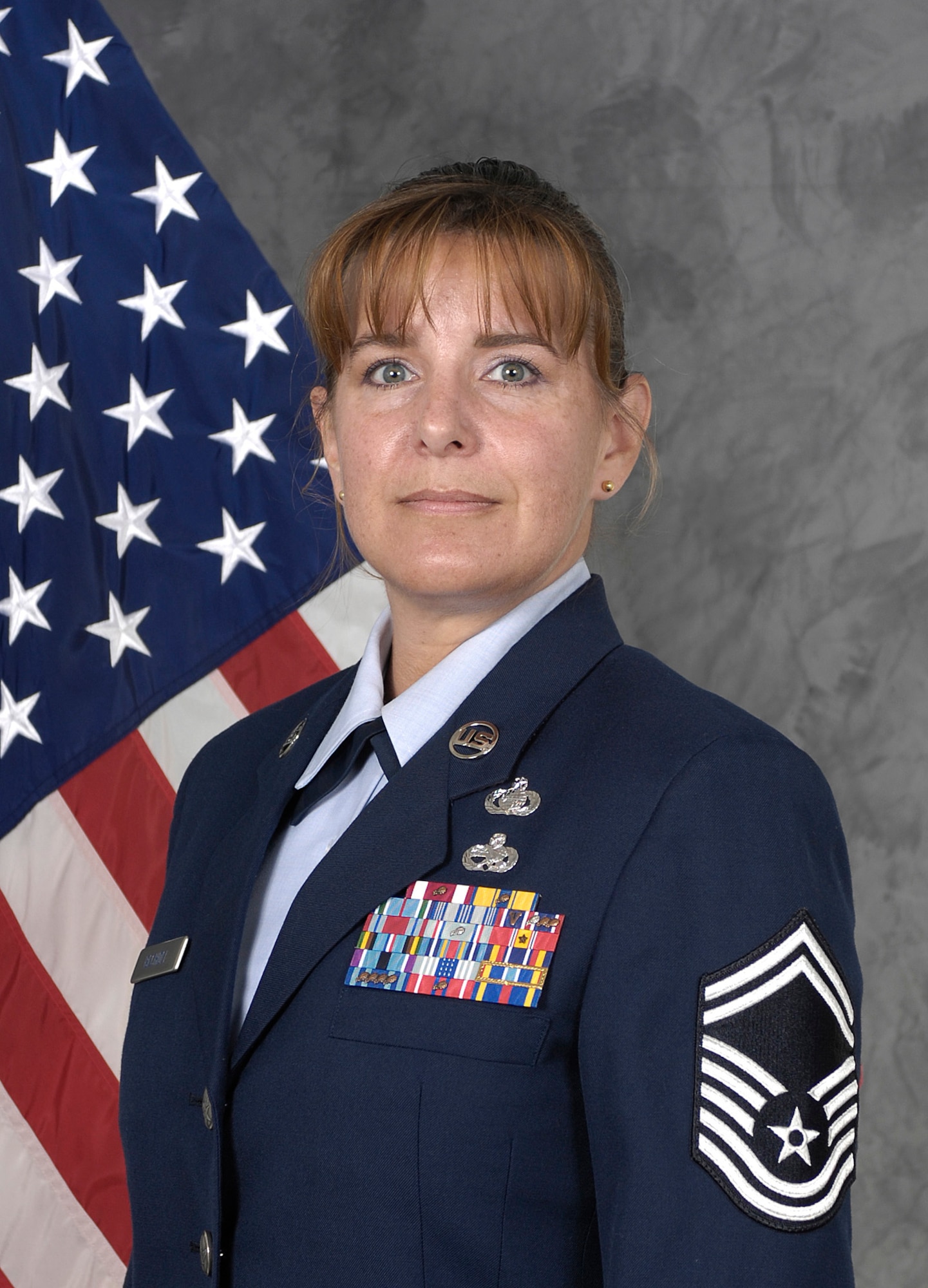 Senior Master Sgt. Mary Bechdel, a former intelligence operations superintendent with the 13th Intelligence Squadron at Beale AFB, Calif., managed intelligence, surveillance and reconnaissance imaging for six combatant commands by leading 380 Airman in 24/7 operations using the Distributed Common Ground System-2. The 12 Outstanding Airmen of the Year are selected based on superior leadership, job performance, significant self-improvement/ personal achievements and base/community involvement. The Air Force Chief of Staff reviews the selections. The selections for the 2009 12 Outstanding Airmen of the Year were announced July 2 by Air Force officials at Randolph Air Force Base, Texas. (U.S. Air Force photo)