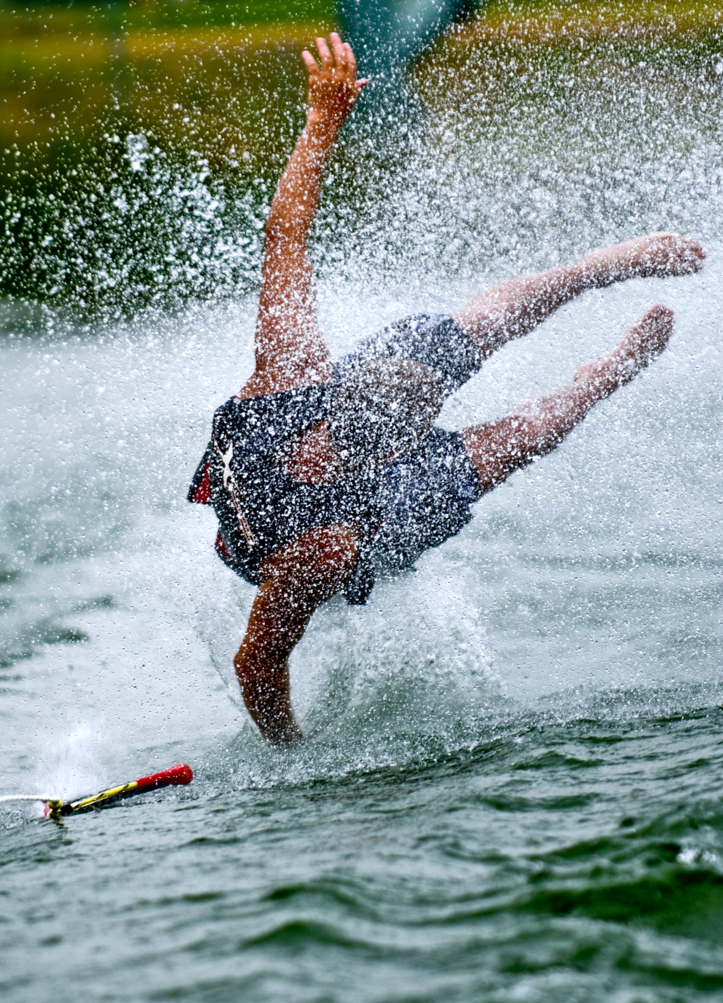 JOE vs. H2O - If you fall while water-skiing, relax! Try to make a smooth water entry. Never tumble forward over the top of your skis. (photo by Tech. Sgt. Matthew Hannen)