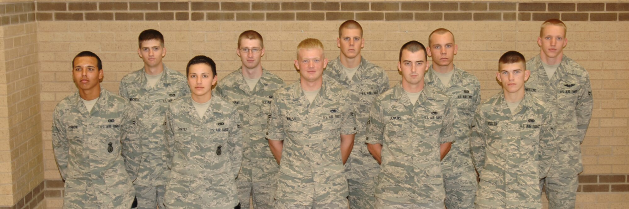 MCCONNELL AIR FORCE BASE, Kan. -- Congratulations to Team McConnell’s newest First Term Airman’s Center graduates who graduated July 17. Back row: Airmen 1st Class John Mitchell, Sean Graham, Airmen Karl Peterson, Erik Beagle, and Airman 1st Class Steven Mertens. Front row: Airmen 1st Class Geston Gordon, Kymberlee Cortez, Nathan Walsh, Kenneth Jenkins, and Airmen James Fuller. (Photo by Staff Sgt. Jamie Train)