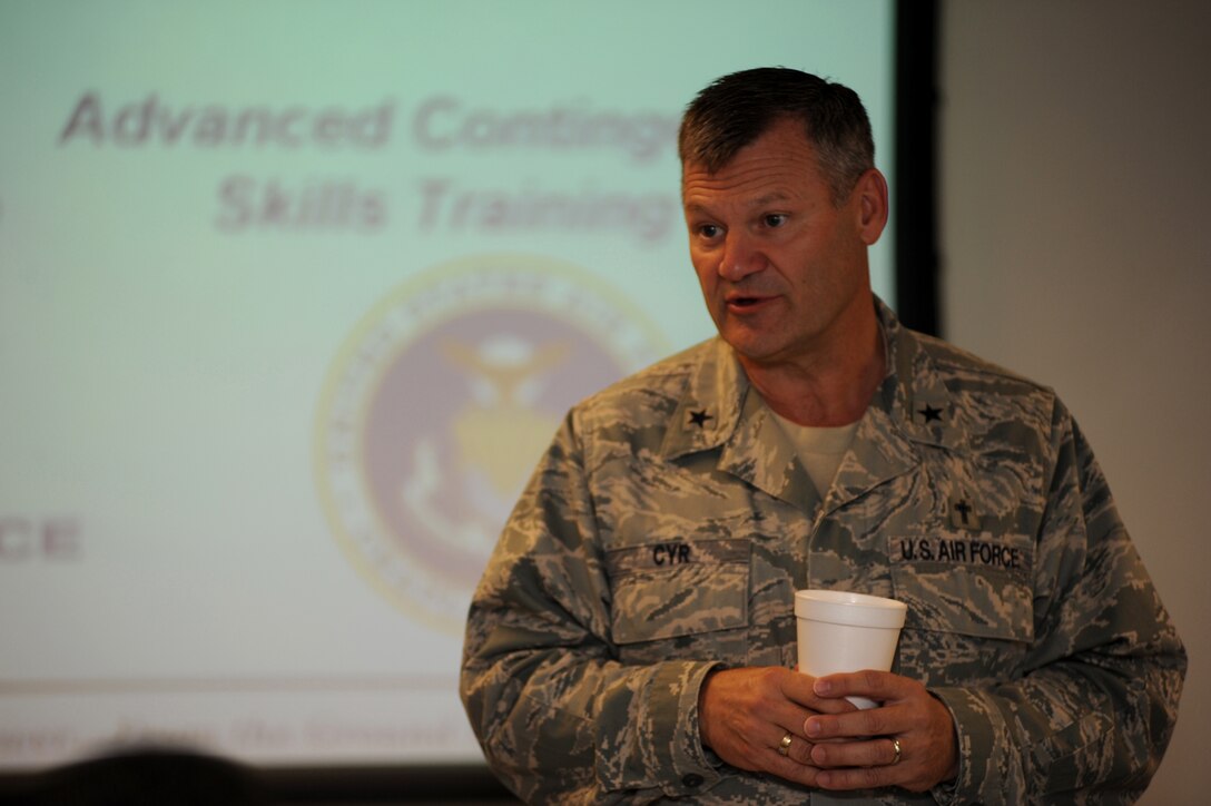 Chaplain (Brig. Gen.) David Cyr, Air Force Deputy Chief of Chaplains, meets with students attending chaplain and chaplain assistant functional training July 9 at the U.S. Air Force Expeditionary Center on Joint Base McGuire-Dix-Lakehurst, N.J.  Chaplain Cyr visited the installation to receive first hand experience the type of training provided by the center.  (U.S. Air Force Photo/Staff Sgt. Nathan G. Bevier) 