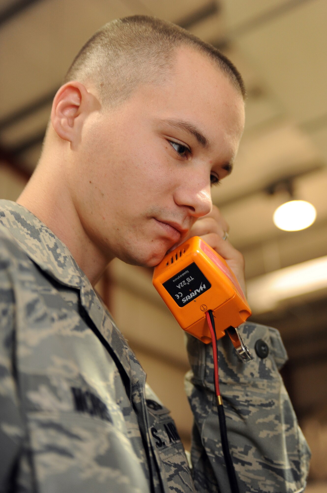 SOUTHWEST ASIA - Senior Airman Thomas Morris, 380th Expeditionary Communications Squadron, tone checks base phone lines during an inspection July 13. Airman Morris is currently working as a telephone maintenance technician, and hails from Taylor, Mich. (U.S. Air Force photo by Tech. Sergeant Charles Larkin Sr) 