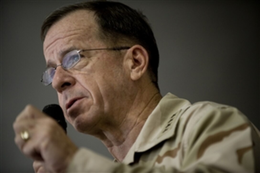Chairman of the Joint Chiefs of Staff Adm. Mike Mullen, U.S. Navy, addresses service members at Bagram Air Base, Afghanistan, on July 14, 2009.  Mullen is accompanying a USO tour featuring Hall of Fame NFL coach Don Shula, NFL running back Warrick Dunn, actors Bradley Cooper and D.B. Sweeney and sports personality and model Leeann Tweeden on a visit to the Central Command area of responsibility.  