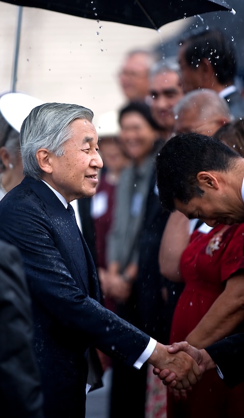 HONOLULU - Japanese Emperor Akihito greets dignitaries at the National Memorial Cemetery of the Pacific, July 15.  Emperor Akihito and Empress Michiko visited Punchbowl Cemetery to lay a wreath and pause for moment of silence. The imperial couple's visit to the cemetery is the first since 1994. (Official U.S. Marine Corps photo by Lance Cpl. Achilles Tsantarliotis)(Released)