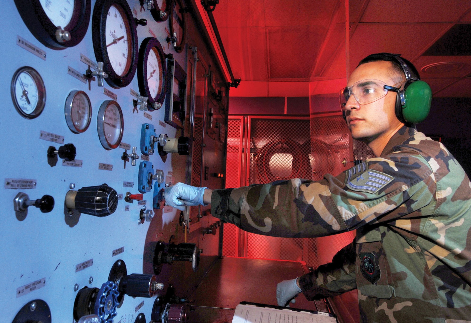 U.S. Air Force Staff Sgt. Shane Olguin, with the 452nd Maintenance Squadron’s Aircraft Pneudraulics Systems Shop, checks the fluid flow on an AV843 hydraulic stand during inspection at March Air Reserve Base, Calif. The stand is used for benchchecking hydraulic and pneumatic components. (U.S. Air Force photo by Tech. Sgt. Carolyn Erfe)