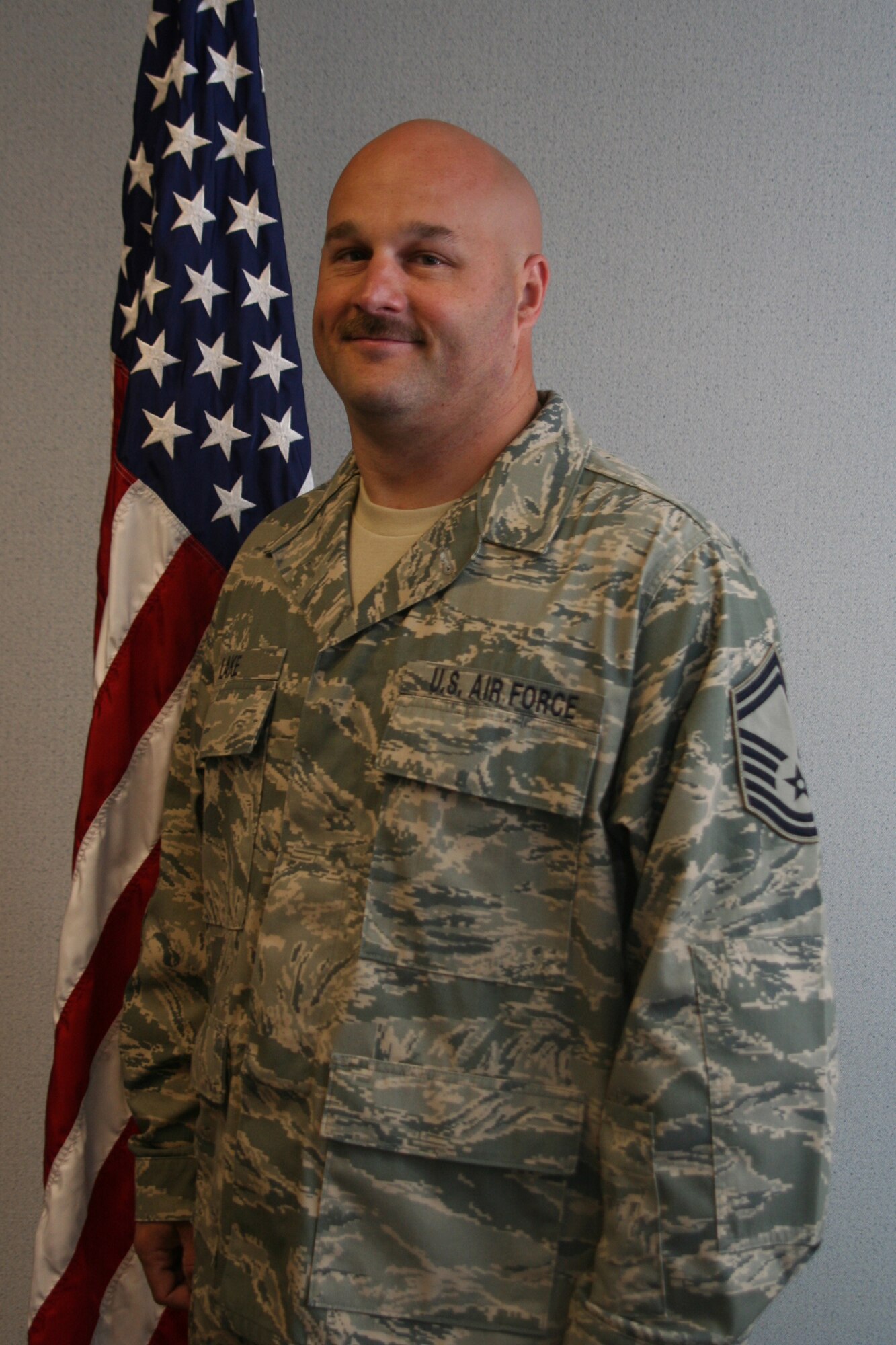 WRIGHT-PATTERSON AIR FORCE BASE, Ohio - Master Sgt. Jack Lake is the 445th Airlift Wing Senior Non Commissioned Officer of the Quarter and is assigned to the 87th Aerial Port Squadron.  Sergeant Lake planned, monitored, and executed the deployment requirements for a squadron 61-member Iraqi Freedom AEF team.  While serving at Manas Air Base, he was a leader of an orphanage support group that rose over $1,100 in donations.  In the local community, Sergeant Lake is a volunteer firefighter and coaches youth hockey, wrestling, and baseball teams. He is currently enrolled in the Community College of the Air Force, working on an Associate Science degree in Transportation. (Air Force photo/Capt. Caroline Wellman)
