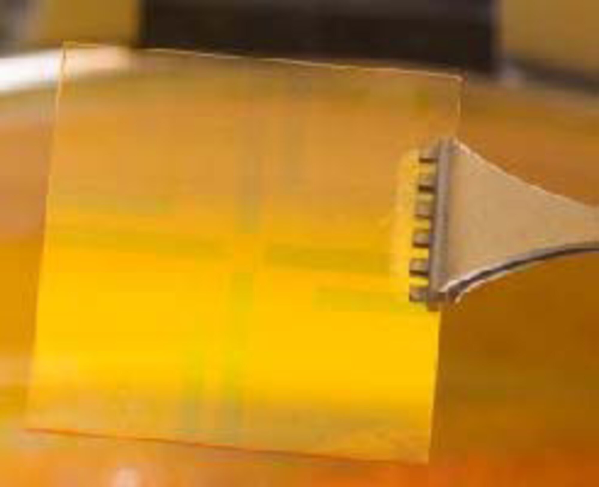 Plexcore® technology, depicted here, allows solar cells to form-fit servicemembers' uniforms to power GPS components and communication devices, and could also be used to "print" solar panels onto thin films incorporated into military tents. Commercial applications include solar energy batteries for cell phones, radios and other portable devices. (U.S. Air Force photo)