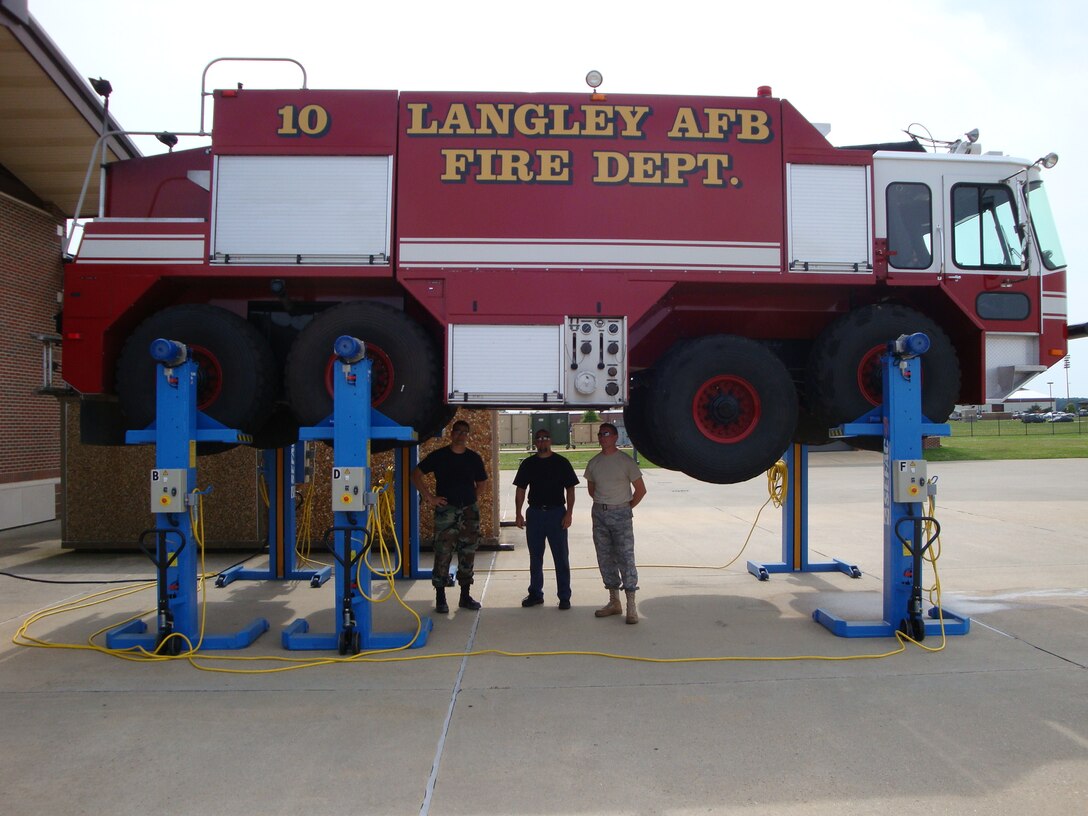 The Langley Fire Department received six lifts recently to assist with repairs to the P-23 crash truck. The new lifts will save approximately $5,000 per maintenance job. (U.S. Air Force photo/James Wise)