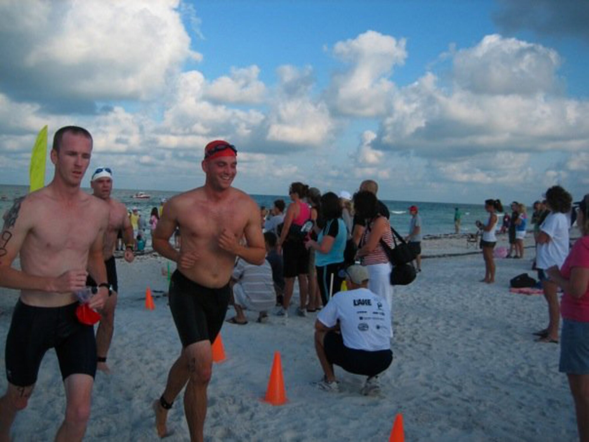 1 LT Travis Posey of the 63rd Air Refueling Squadron at Macdill Air Force Base heads towards the finish line at the Annual Dunedin Triathalon.