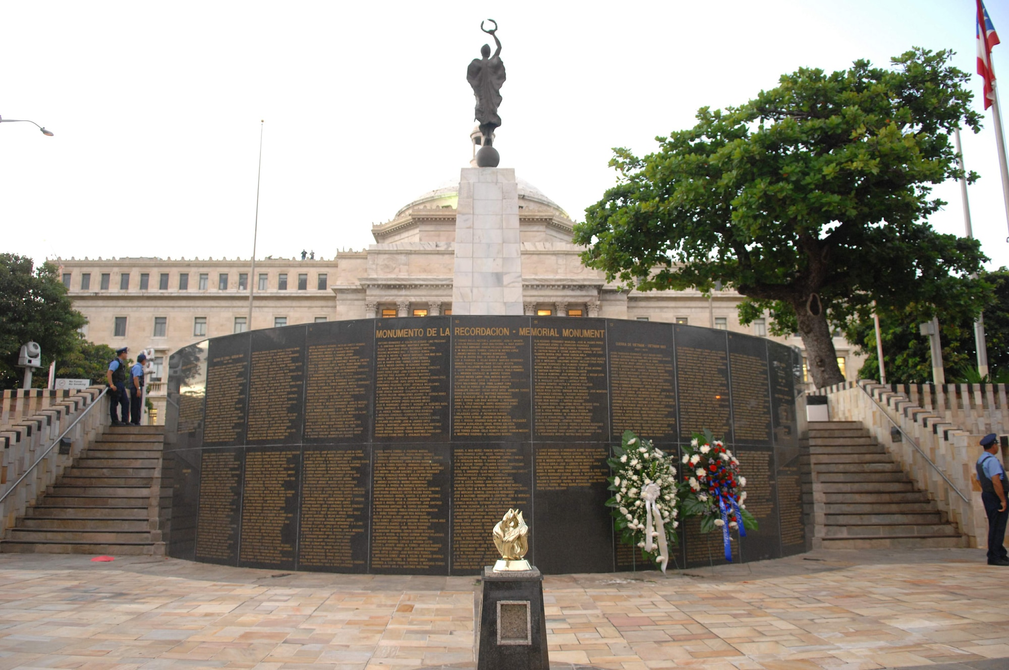 Wreaths placed by the Commonwealth of Puerto Rico and the League of United Latin American Citizens stand in front of El Capitolio 's El Monumento de la Recordacion as part of the Memorial Ceremony in Old San Juan, Puerto Rico, the location of the 2009 LULAC Convention and Exposition July 14 at San Juan, Puerto Rico. LULAC is the nation's oldest and largest Hispanic organization advocating for Latinos in the United States for 80 years. (U.S. Air Force Photo/Tech. Sgt. Francisco V. Govea II)