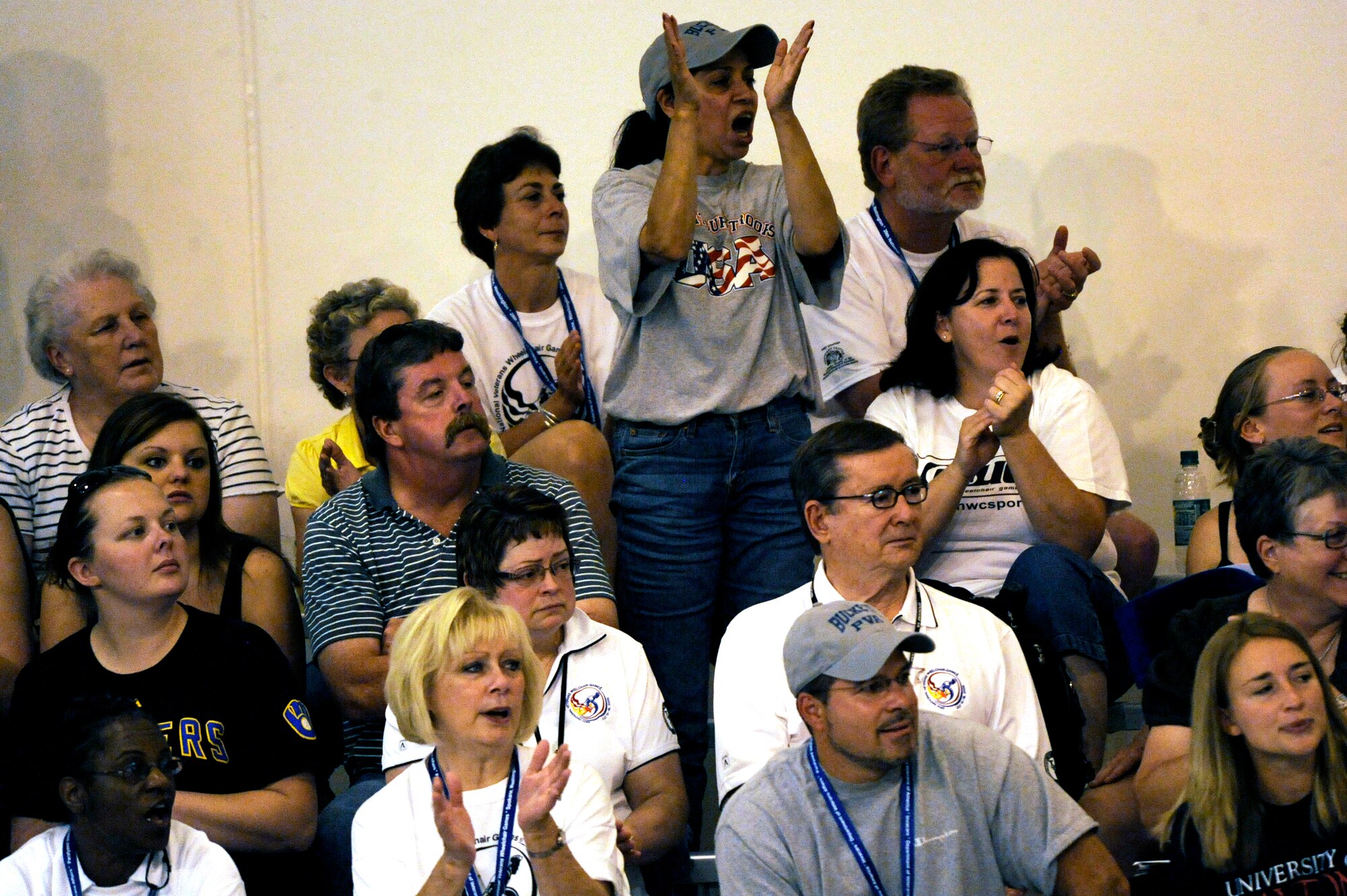 Veterans, family members and volunteers cheer inside the Whitworth University swimming pool during the 29th National Veterans Wheelchair Games July 15 in Spokane, Wash. The 29th National Veterans Wheelchair Games runs through July 19. (U.S. Air Force photo/Staff Sgt. Desiree N. Palacios)