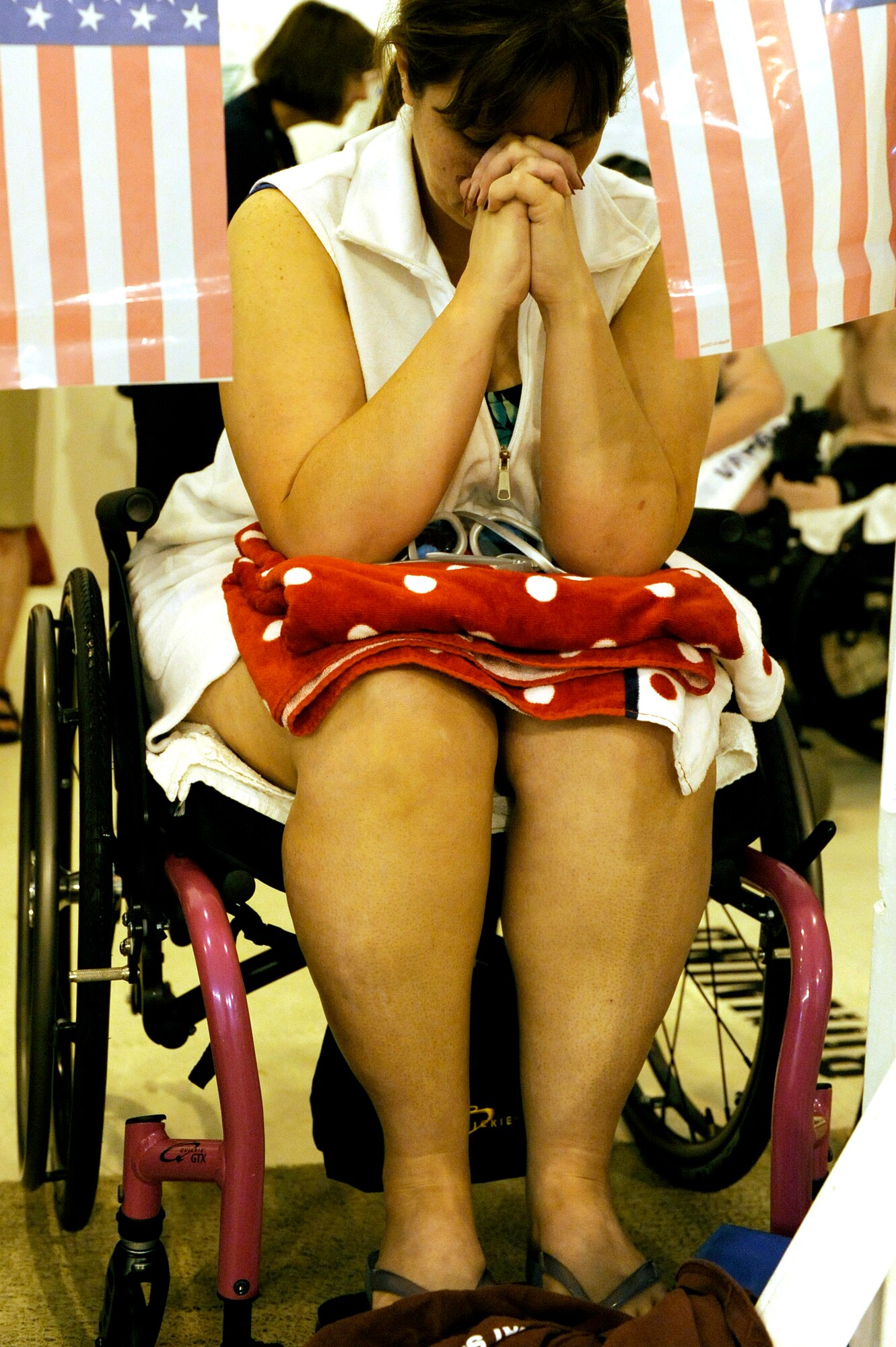 Terri Fuda prays before she competes in the swimming competition held at the Whitworth University swimming pool during the 29th National Veterans Wheelchair Games July 15 in Spokane, Wash. Ms. Fuda is an Air Force veteran from Gillespie, Ill.  (U.S. Air Force photo/Staff Sgt. Desiree N. Palacios)