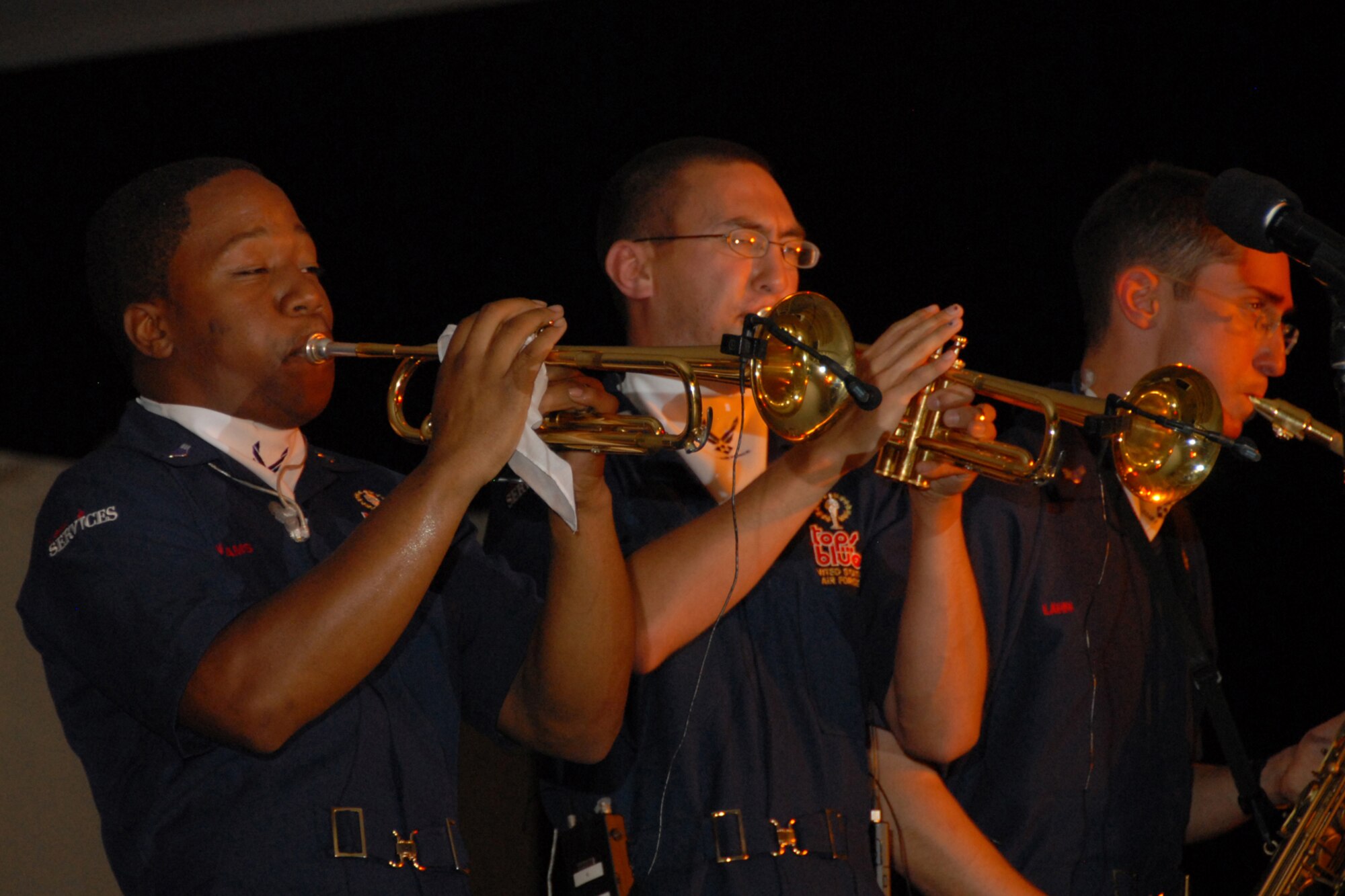 Members of Tops in Blue, the Air Force's premier entertainment showcase, perform for an audience of deployed U.S. and coalition forces in Southwest Asia July 14. Tops in Blue serves as an expeditionary entertainment unit that provides quality entertainment from within Air Force resources to Air Force personnel stationed worldwide and in deployed locations while simultaneously promoting community relations, supporting recruiting efforts and serving as ambassadors for the United 
States. (U.S. Air Force Photo/Tech Sgt. Jason W. Edwards)