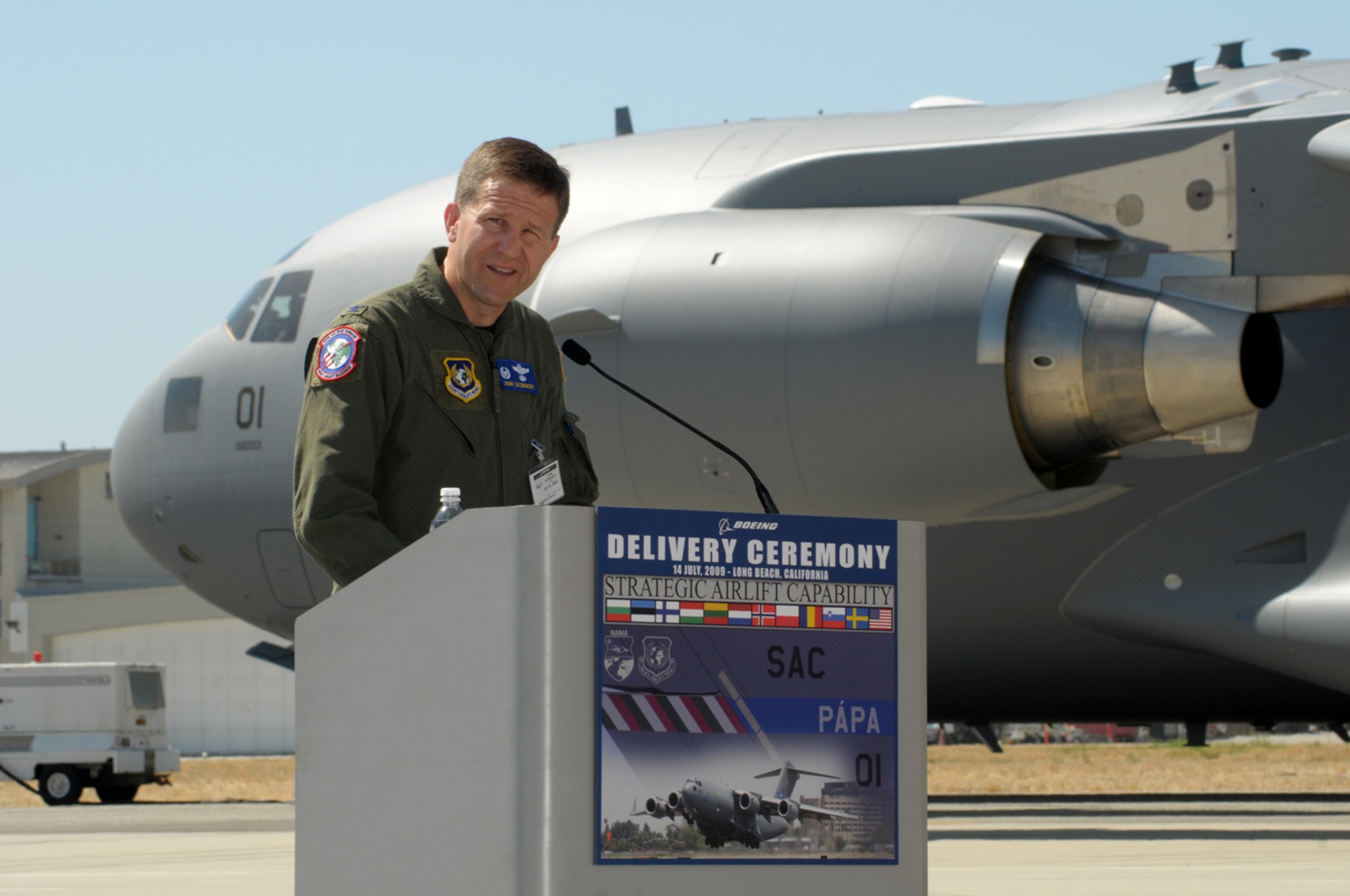 LONG BEACH, Calif.--U.S. Air Force Col. John Zazworsky officially received the first of three C-17s to be acquired by the 12-nation Strategic Airlift Capability Program.  The colonel commands the program’s multinational, operational-level unit, the Heavy Airlift Wing, which includes personnel from NATO member nations Bulgaria, Estonia, Hungary, Lithuania, the Netherlands, Norway, Poland, Romania, Slovenia and the United States, as well as from Partnership for Peace nations Finland and Sweden. (U.S. Air Force photo/Joseph Juarez)