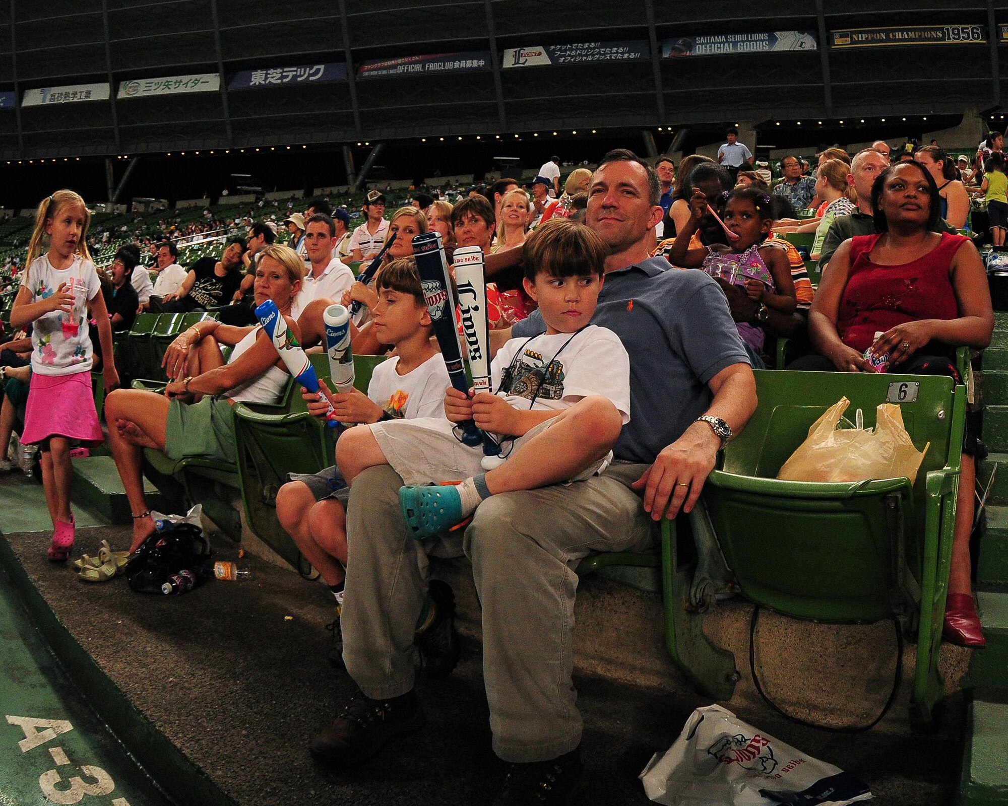 TOKOROZAWA, Japan --  Lt. Col. Robert McCrady, 374th Operations Group deputy commander, and his family were among the more than 30 guests of the Musashimurayama Yokota Friendship Club who were treated to a Japanese Baseball League game between the Saitama Seibu Lions and the Tohoku Rakuten Golden Eagles July 14. The club hosts several events throughout the year to strengthen the relationship between the two communities. (U.S. Air Force photo/Airman 1st Class Michael Dillon)

