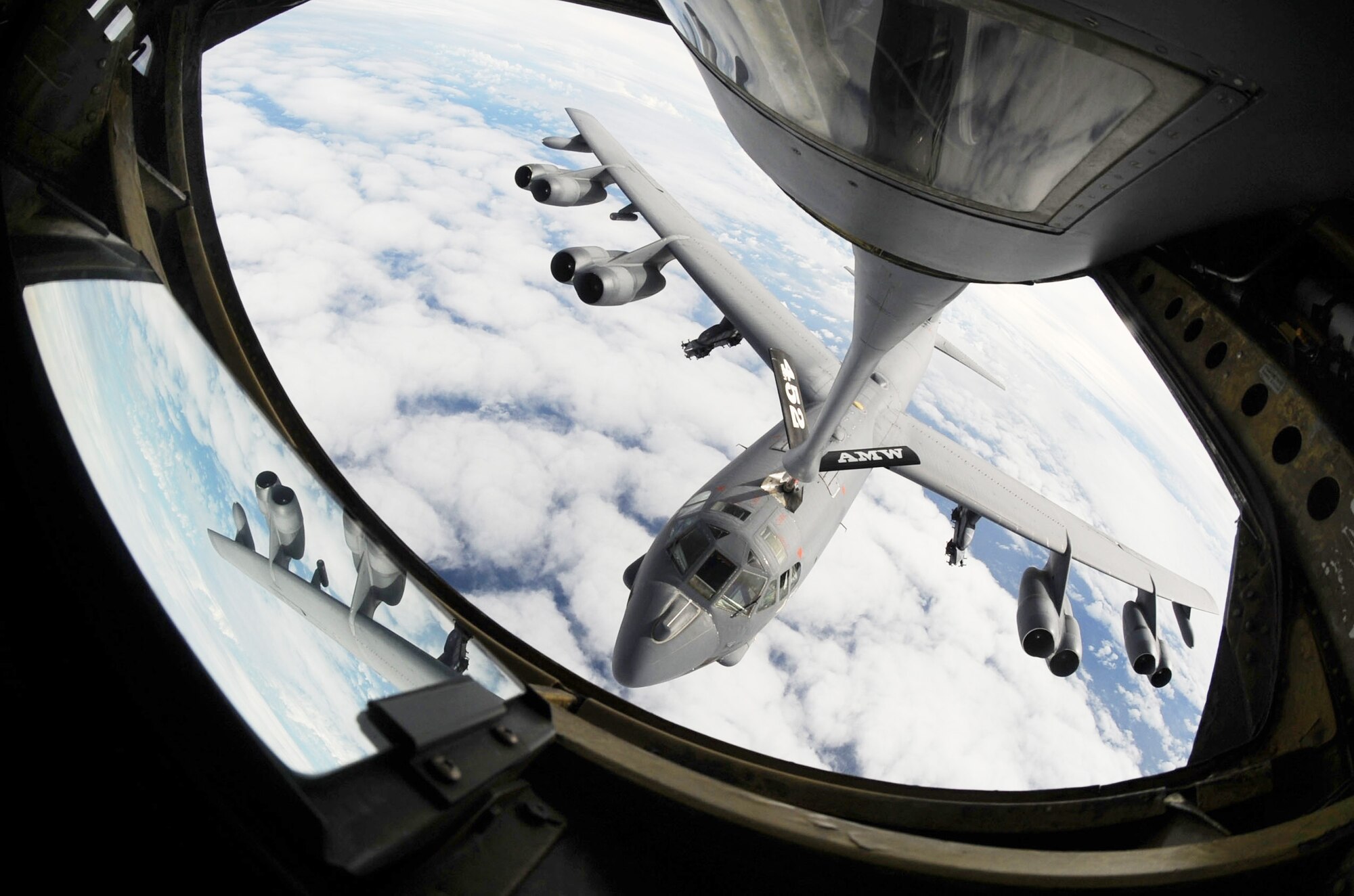 A KC-135 Stratotanker refuels a B-52 Stratofortress July 13 over the Pacific Ocean during Talisman Saber 09, a U.S. Pacific Command-directed, bilateral command post and field-training exercise designed to maintain a high level of interoperability between U.S. and Australian forces..  (U.S. Air Force photo/Senior Airman Christopher Bush)