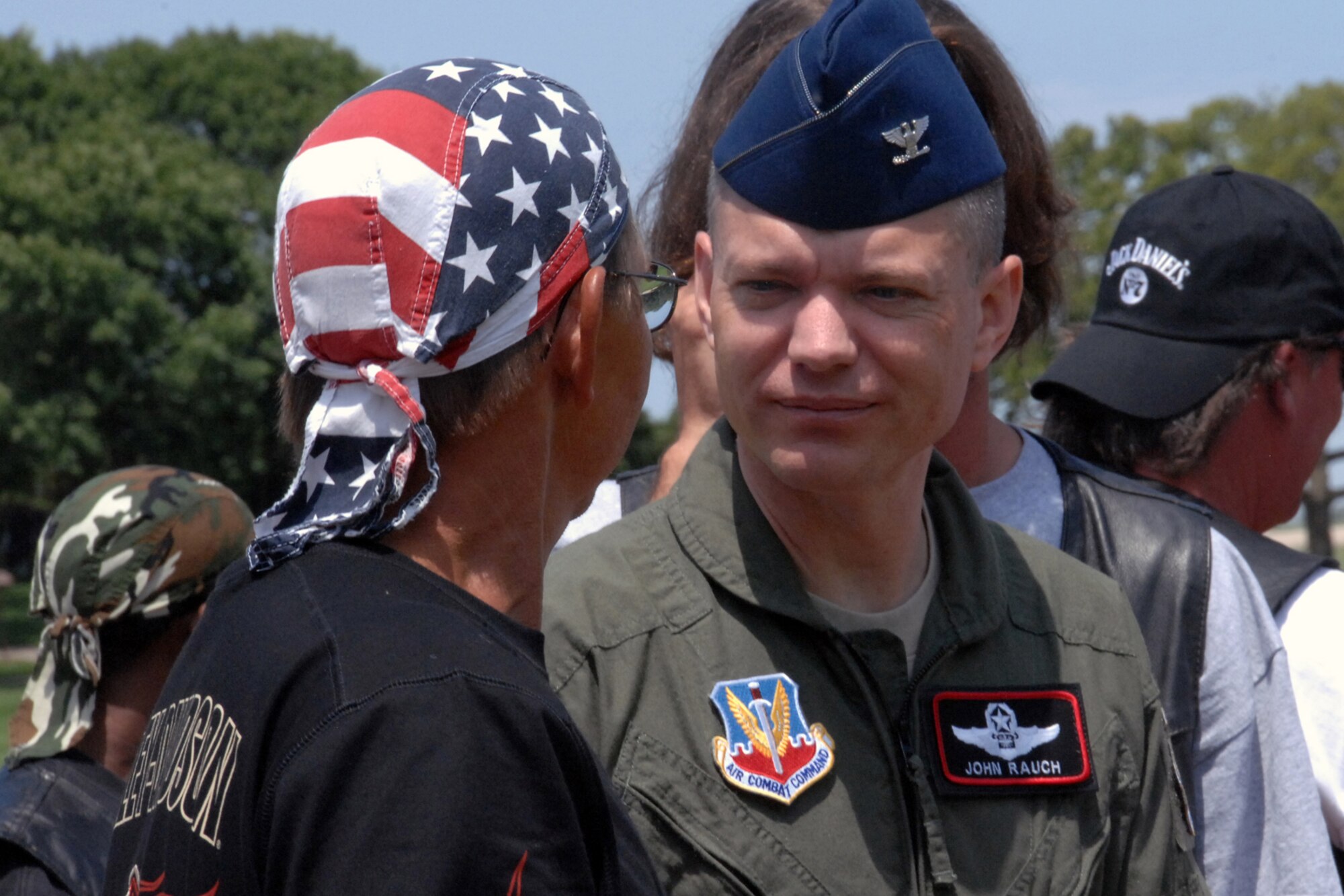 OFFUTT AIR FORCE BASE, Neb. -- Col. John Rauch, 55th Wing vice commander, speaks with participants of the Yellow Ribbon Run fundraiser at the parade grounds July 12. More than 460 riders from various motorcycle clubs participated in the event.

U.S. Air Force Photo By: Kendra Williams