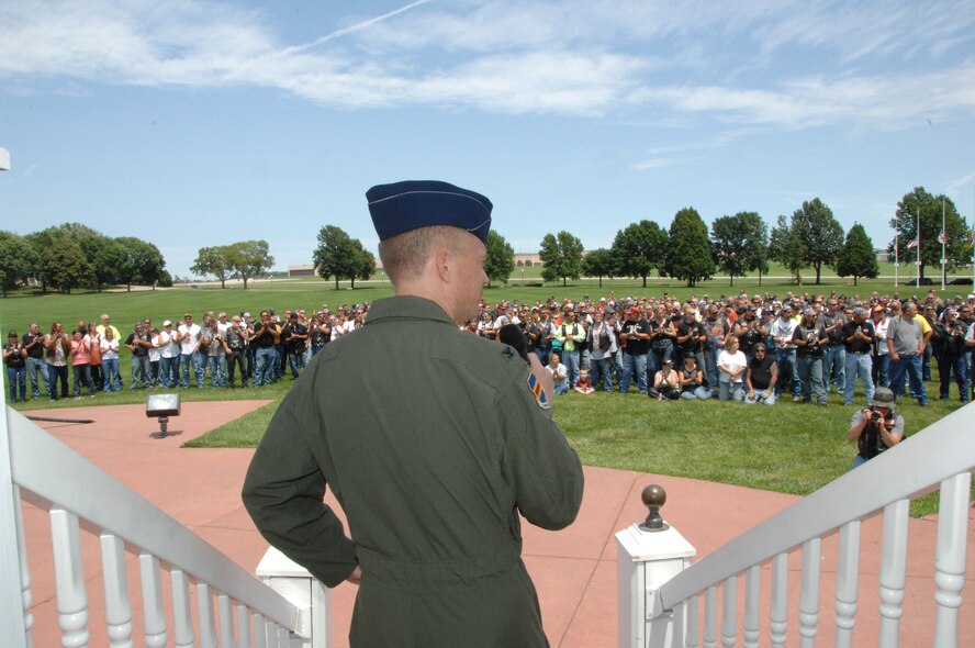 OFFUTT AIR FORCE BASE, Neb. -- Col. John T. Rauch, 55th Wing vice commander, thanks members of various motorcycle clubs for their participation in the 7th Annual Yellow Ribbon Run July 12.  Riders came from as far away as New Mexico to participate in the fundraiser which raised more than $8000 for the Friends of the Family Support Center to support the dependants of military members that are currently deployed. U.S. Air Force Photo by Dana P. Heard